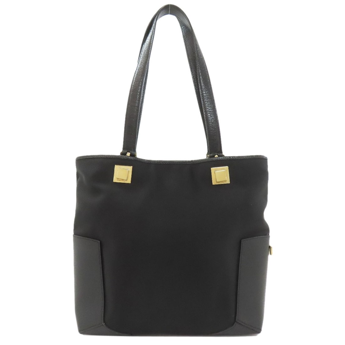 Salvatore Ferragamo Logo Handbag Nylon Leather: Salvatore Ferragamo Logo Handbag Nylon Leather The Salvatore Ferragamo logo handbag features a striking black exterior made from nylon canvas. This stylish accessory boasts the iconic brand's