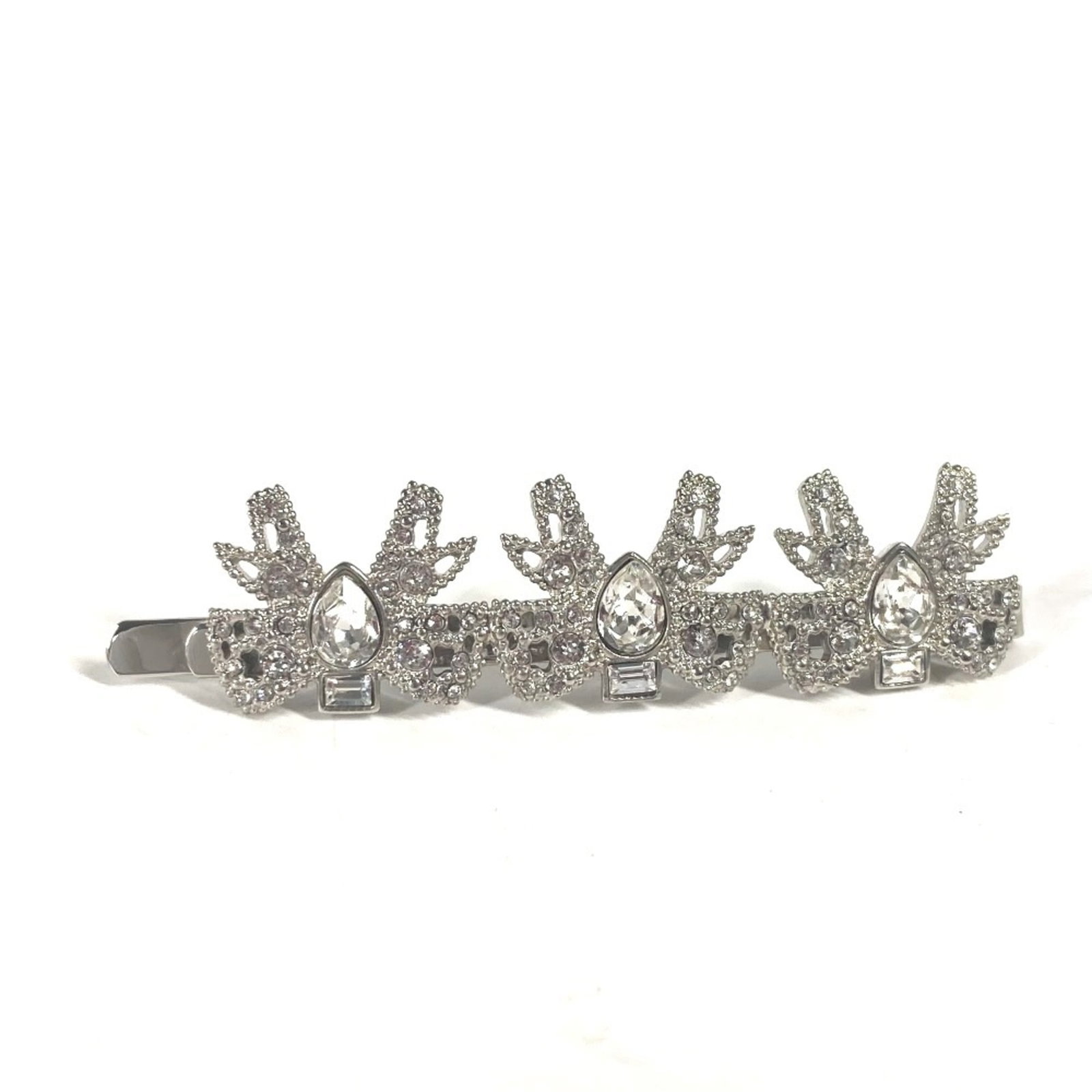 Miu Miu Hair Pin Metal: Miu Miu Hair Pin Metal The Miu Miu Hair Pin Metal features a sleek silver metal design with a rhinestone stone. Its compact size of 6.3cm x 2.48'' makes it a versatile accessory for adding a touch of 