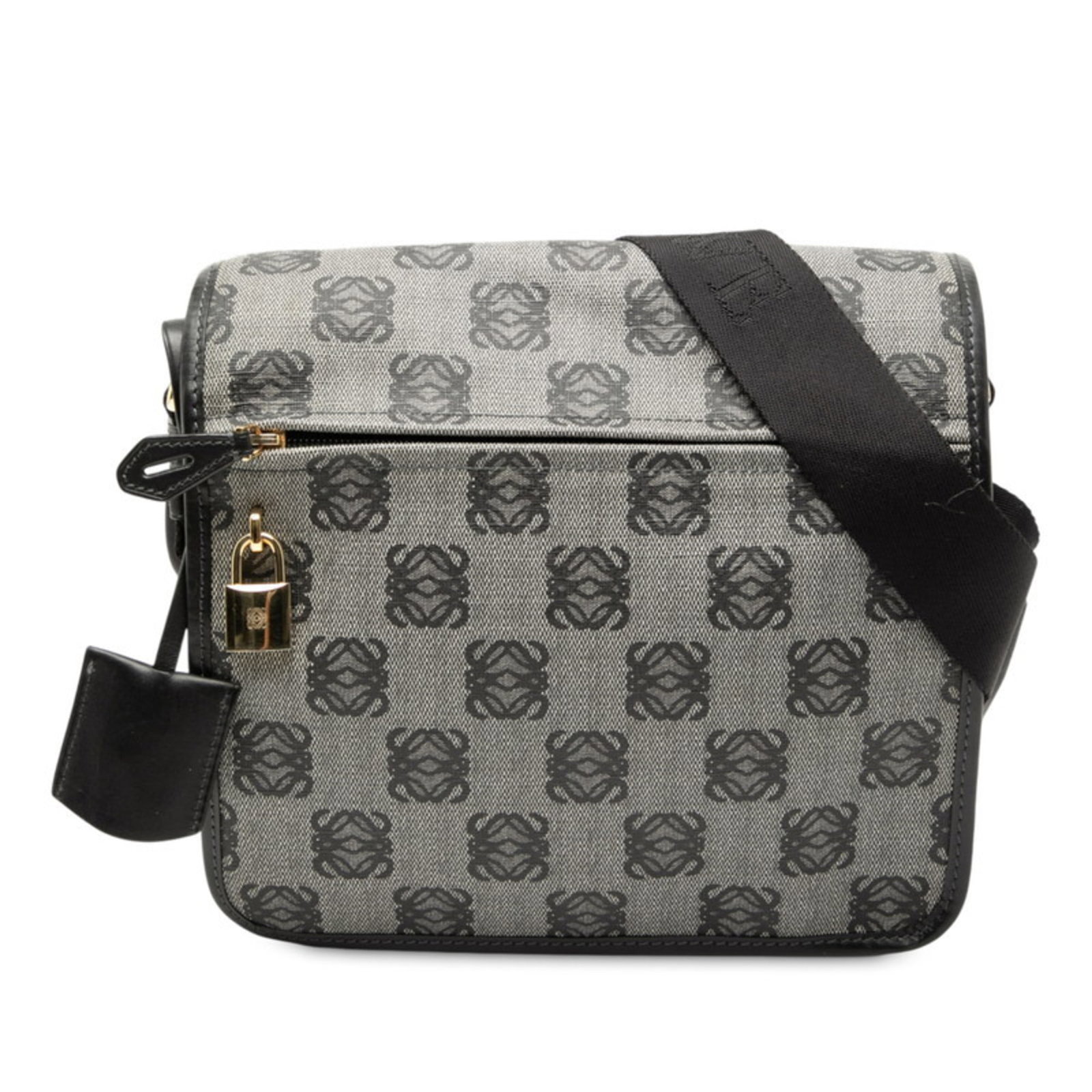 Loewe Shoulder Bag Canvas Pvc: Loewe Shoulder Bag Canvas Pvc Canvas and PVC materials blend for a unique look in this Loewe shoulder bag. With its distinctive combination of textures and colors, this black and gray design adds an e