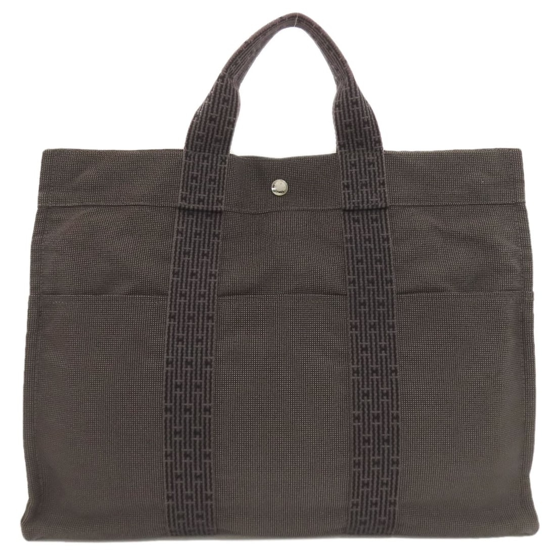 Her Handbag Hermes Linemm Canvas: Her Handbag Hermes Linemm Canvas Gray canvas handbag from HERMES featuring a stylish design. The bag's exterior material and color provide a distinctive look, while its style classification indicates 