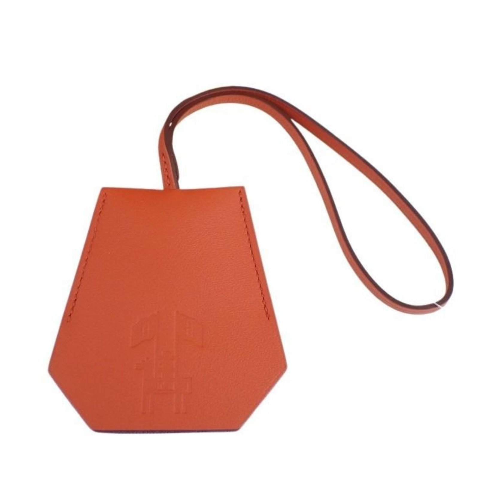 Hermes Clochette Swift Leather: Hermes Clochette Swift Leather Swift Leather Clochette from Hermes boasts its sleek design and compact size. The Clochette's swift leather material provides a luxurious feel, while its open condition 