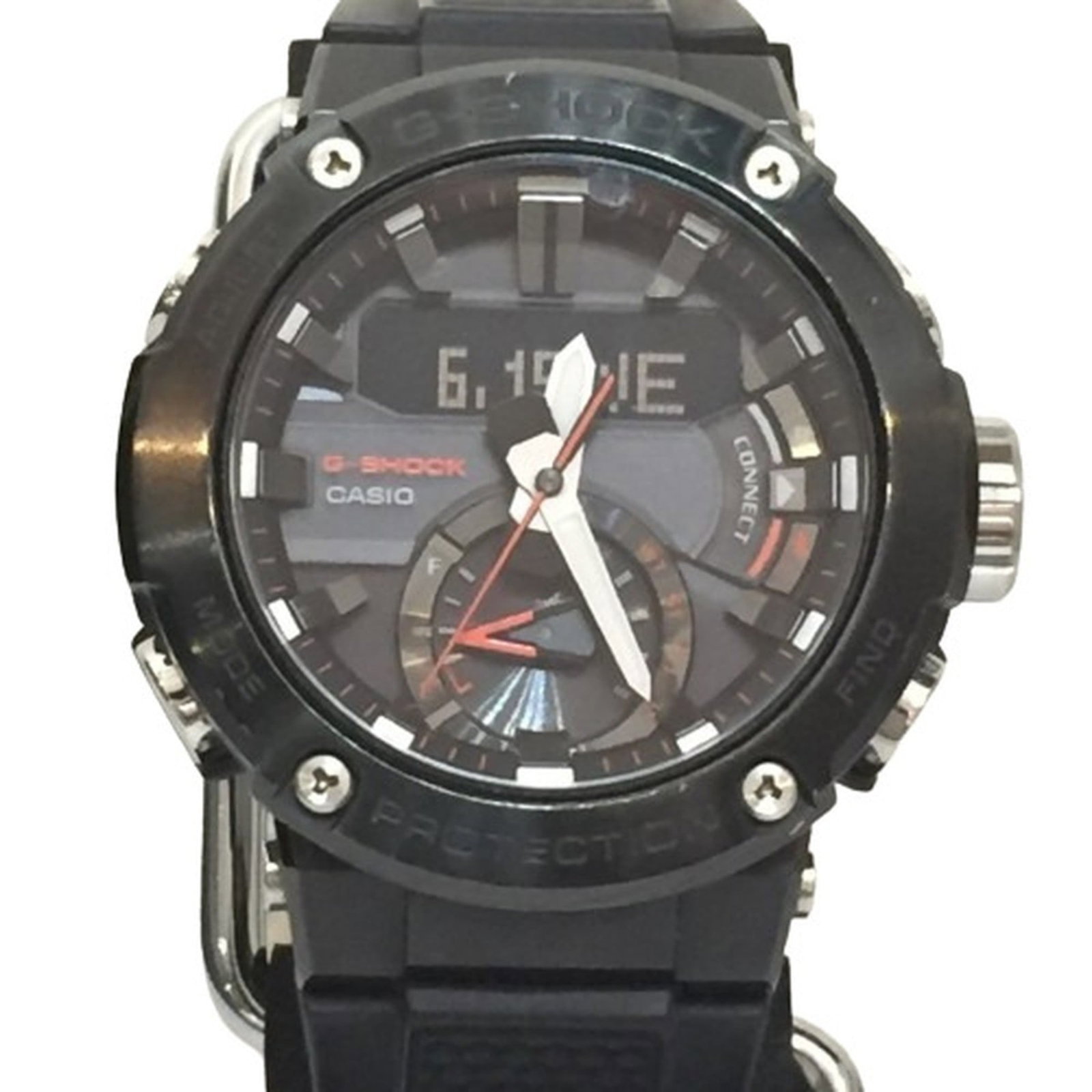 Strict Watch Rules Apply: Strict Watch Rules Apply This Casio wristwatch boasts an all-black design with a carbon case and analog display. With traces of usage visible, this watch has seen its fair share of wear and tear, maki