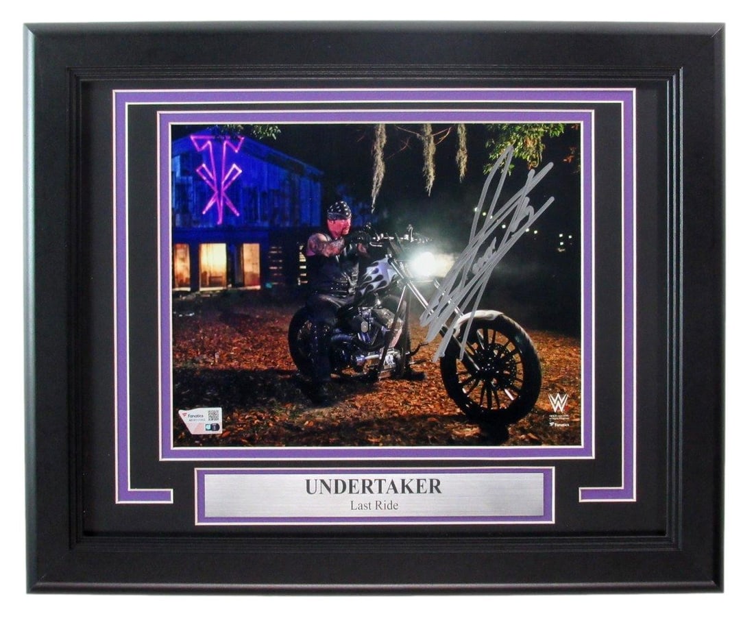 WWE Superstar Framed Photo Autographed 8x10 By Undertaker: WWE Superstar Framed Photo Autographed 8x10 By Undertaker This 8x10 framed photo of WWE Superstar The Undertaker has been signed by the legendary wrestler. A rare opportunity for fans to own a piece