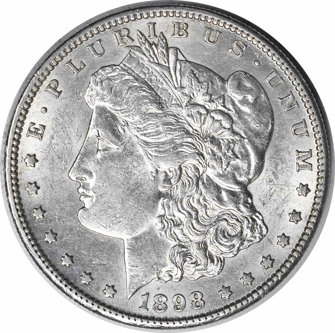 Silver AU Dollar 1898 Slider Uncertified: Silver AU Dollar 1898 Slider Uncertified The Silver AU Dollar 1898 Slider Uncertified boasts an impressive design from renowned artist George T. Morgan, featuring a reeded edge and a diameter of