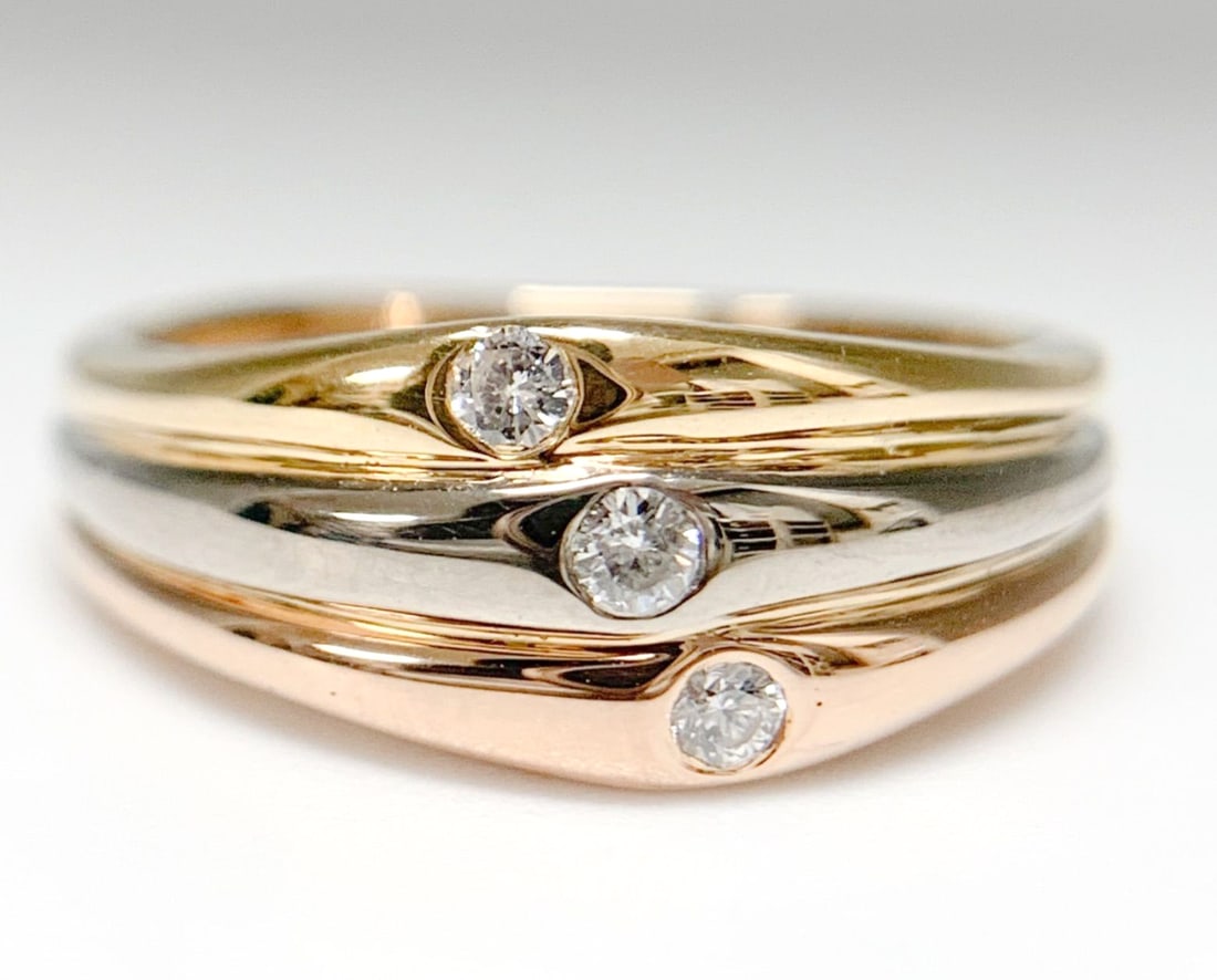 Cartier Vintage Diamond 18k Yellow White Rose Gold Trinity Three Color Band Ring: Cartier Vintage Diamond 18k Yellow White Rose Gold Trinity Three Color Band Ring Cartier's vintage charm shines in this exquisite three-color band ring featuring 3 round diamonds and a multi-tone 18k