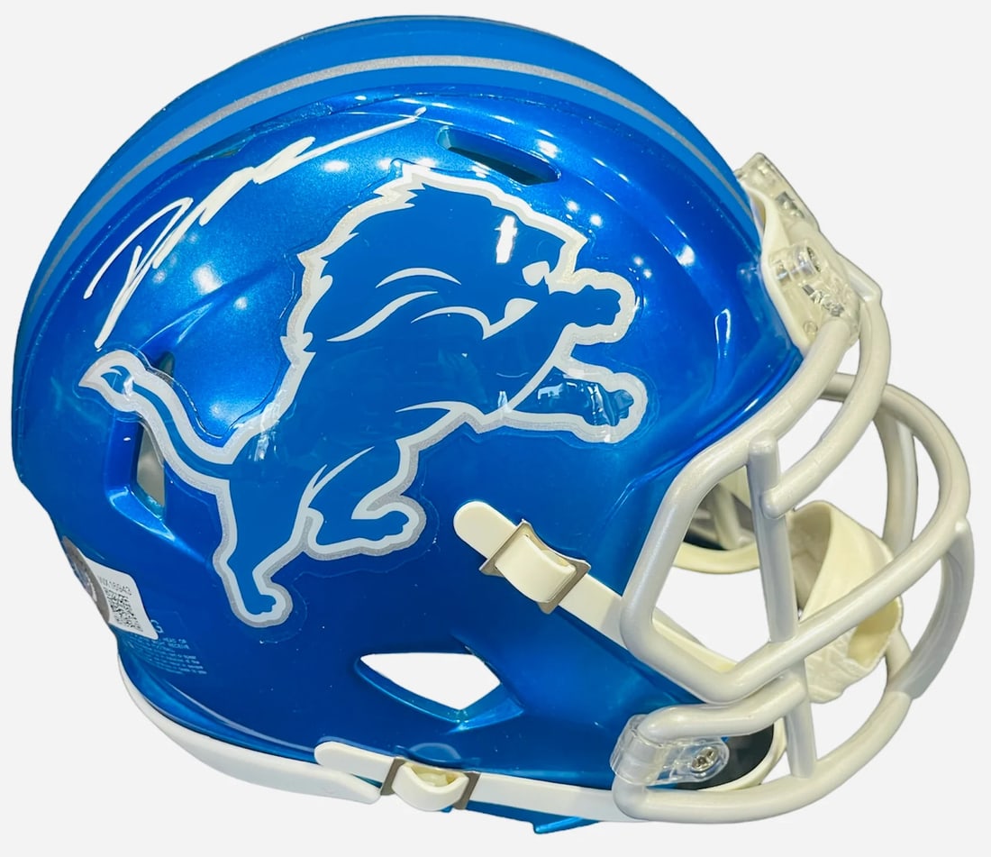 Lions Flash Mini Helmet Autographed By D Andre Swift Beckett: Lions Flash Mini Helmet Autographed By D Andre Swift Beckett Signed in white paint pen across the side of this mini helmet by D'Andre Swift, an autographed collectible from the Detroit Lions. The