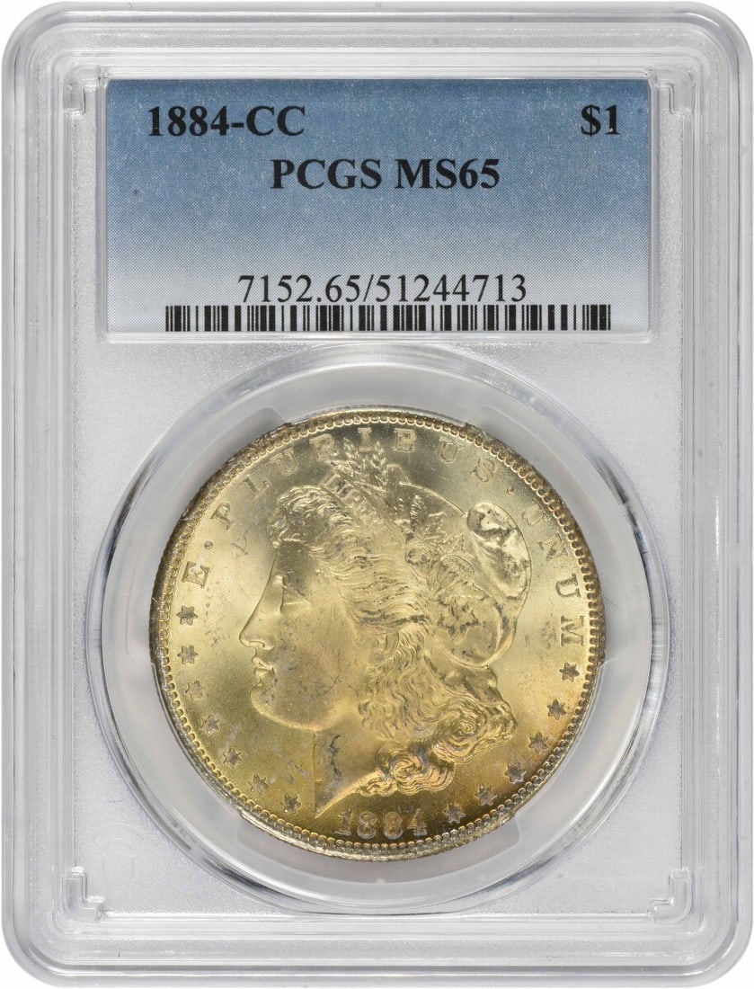 Morgan Silver Dollar CC 65 Toned: Morgan Silver Dollar CC 65 Toned The Morgan Silver Dollar CC 65 Toned boasts an impressive MS65 grade, showcasing exceptional detail and luster. This 1884 coin features a striking toning effect, addin