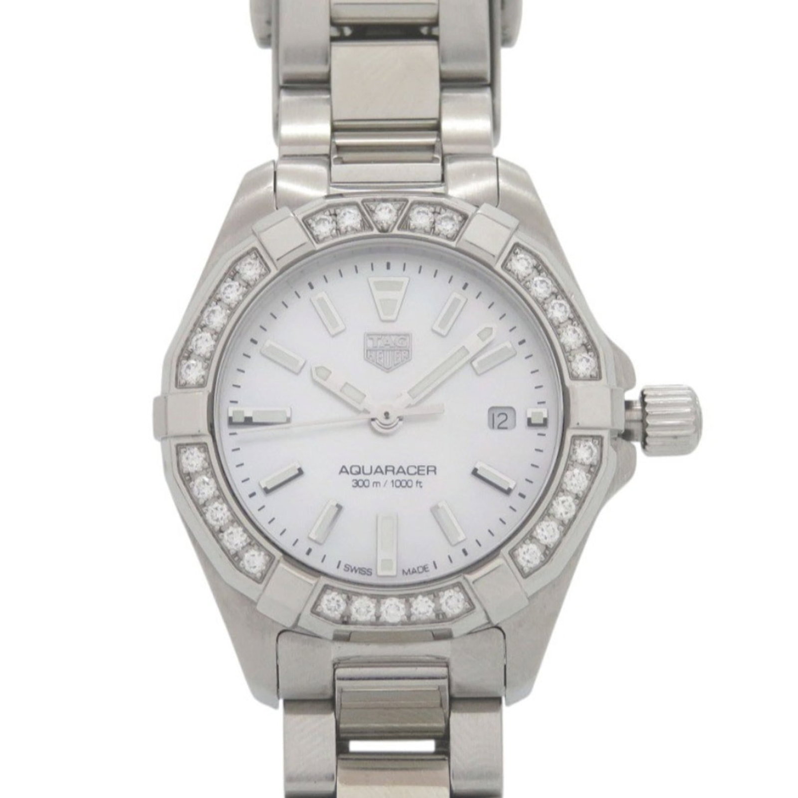 Heuer Watch Tag: Heuer Watch Tag Stainless steel case and band add a sleek touch to this silver and white analog watch. A diamond accent adds a touch of luxury to the crisp white dial. With its classic design and dura