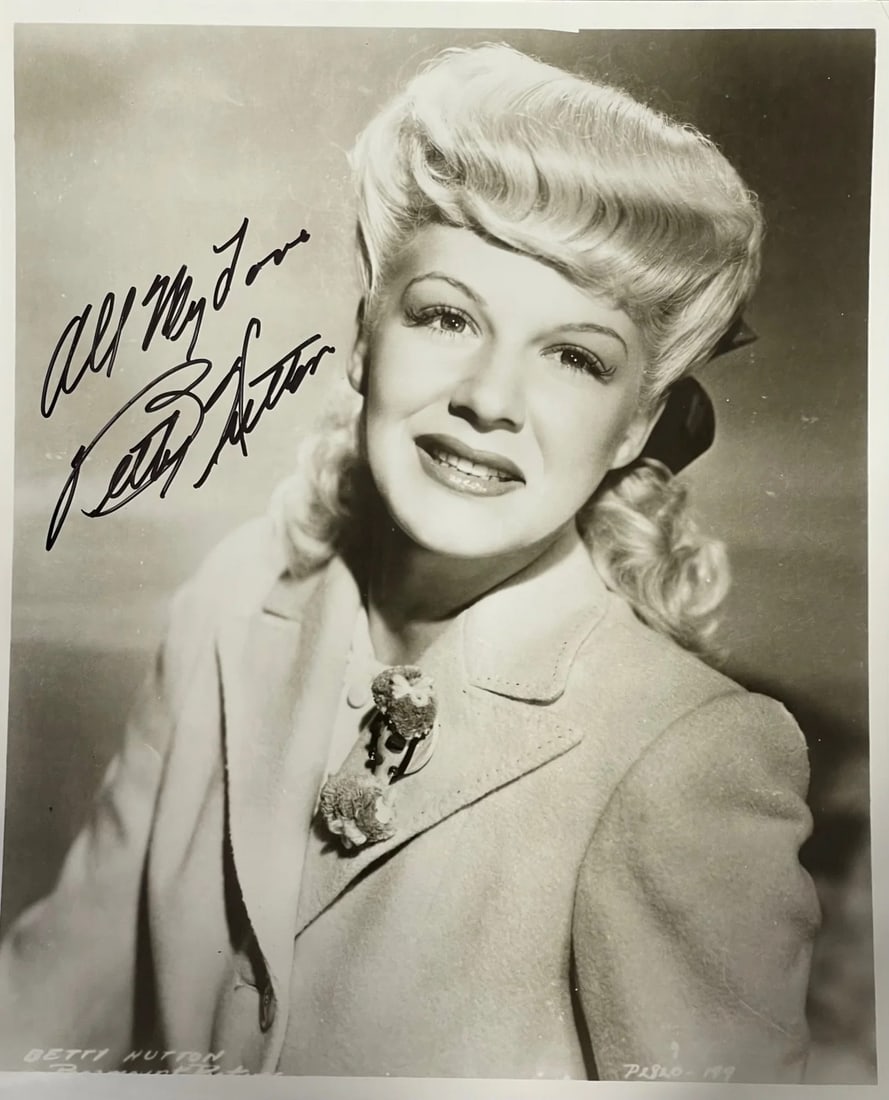 Hotton Betty Autographed 8x10 Celebrity Photo: Hotton Betty Autographed 8x10 Celebrity Photo The Hotton Betty Autographed 8x10 Celebrity Photo features an 8x10 black and white photograph signed in sharpie across the front with the inscription "All