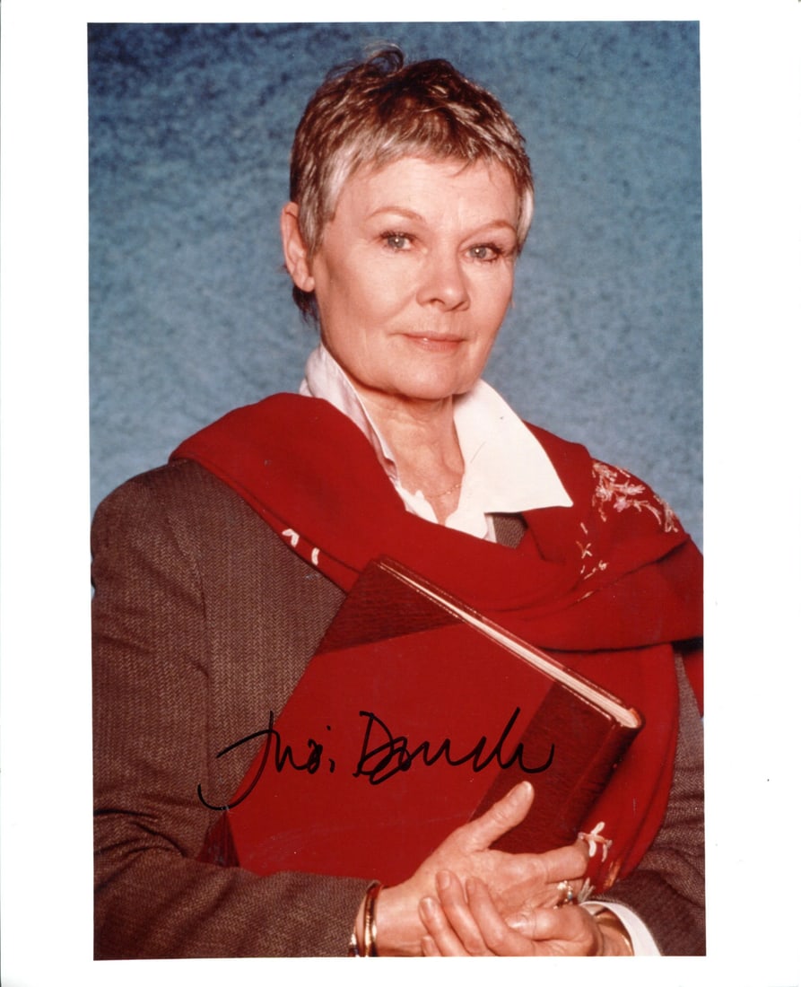 Dench Judi Autographed Photo: Dench Judi Autographed Photo Authentic Judi Dench Autographed 8x10 Photo - Signed in Black Sharpie. This photo features the renowned actress Judi Dench, signed across the front in black sharpie by