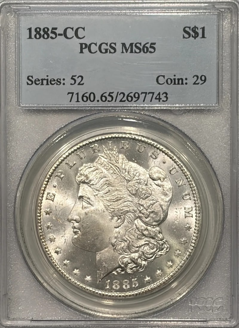 MORGAN DOLLAR 1885 VERY PQ: MORGAN DOLLAR 1885 VERY PQ The Morgan Dollar 1885 Very PQ (Proof Quality) coin boasts an MS 65 grade, indicating exceptional condition and detail. This uncirculated mint piece features a silver