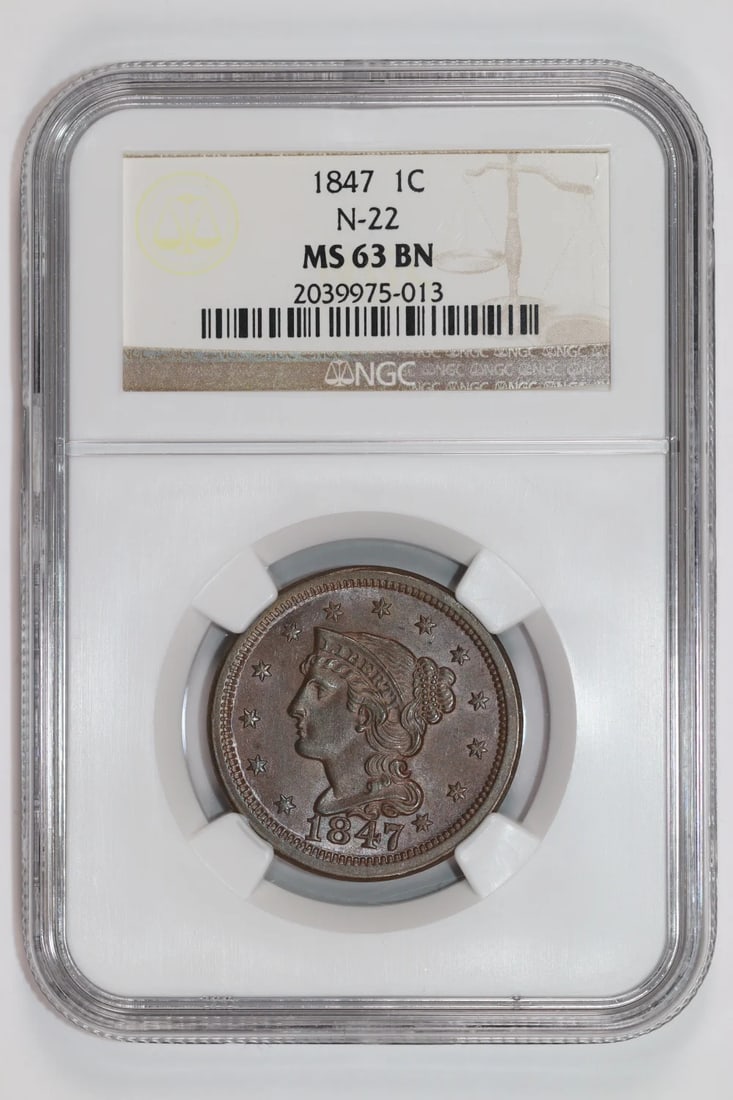 Braided Hair Cent 1847 Large In Original Condition: Braided Hair Cent 1847 Large In Original Condition The Braided Hair Cent of 1847 is a rare and historic coin in its original condition. Certified MS 63 by NGC, this uncirculated specimen showcases
