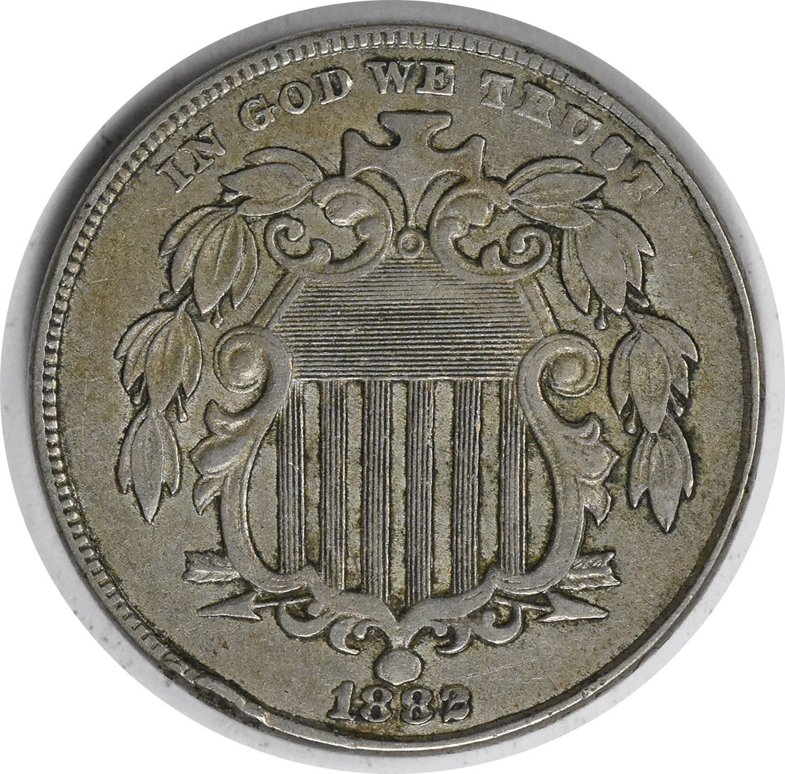 Shield nickel of 1882 RPD EF Uncertified: Shield nickel of 1882 RPD EF Uncertified The Shield nickel of 1882 RPD boasts an EF Uncertified grade, showcasing its exceptional condition. This circulated coin features a striking design by James