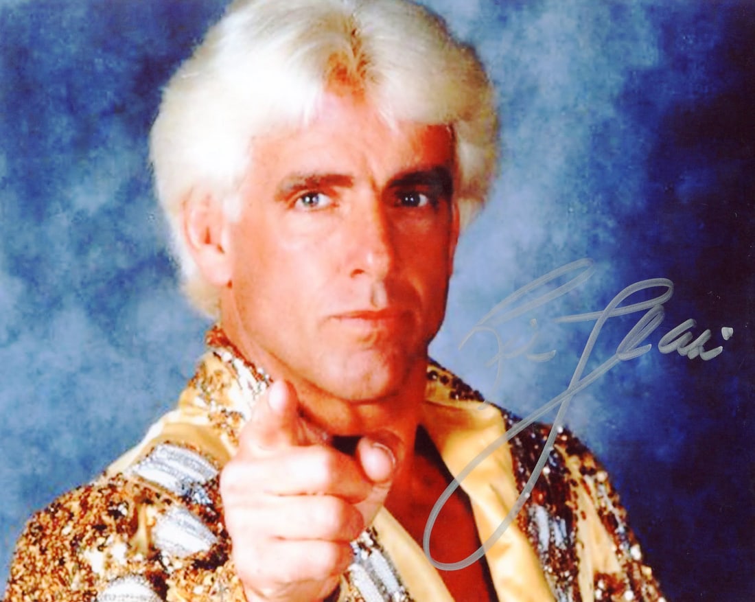 Strict Rules Apply to Original Title: Strict Rules Apply to Original Title Ric Flair's charisma and style are captured in this authentic 8x10 photo, signed with silver sharpie across the front. The item comes with authentication from Rich