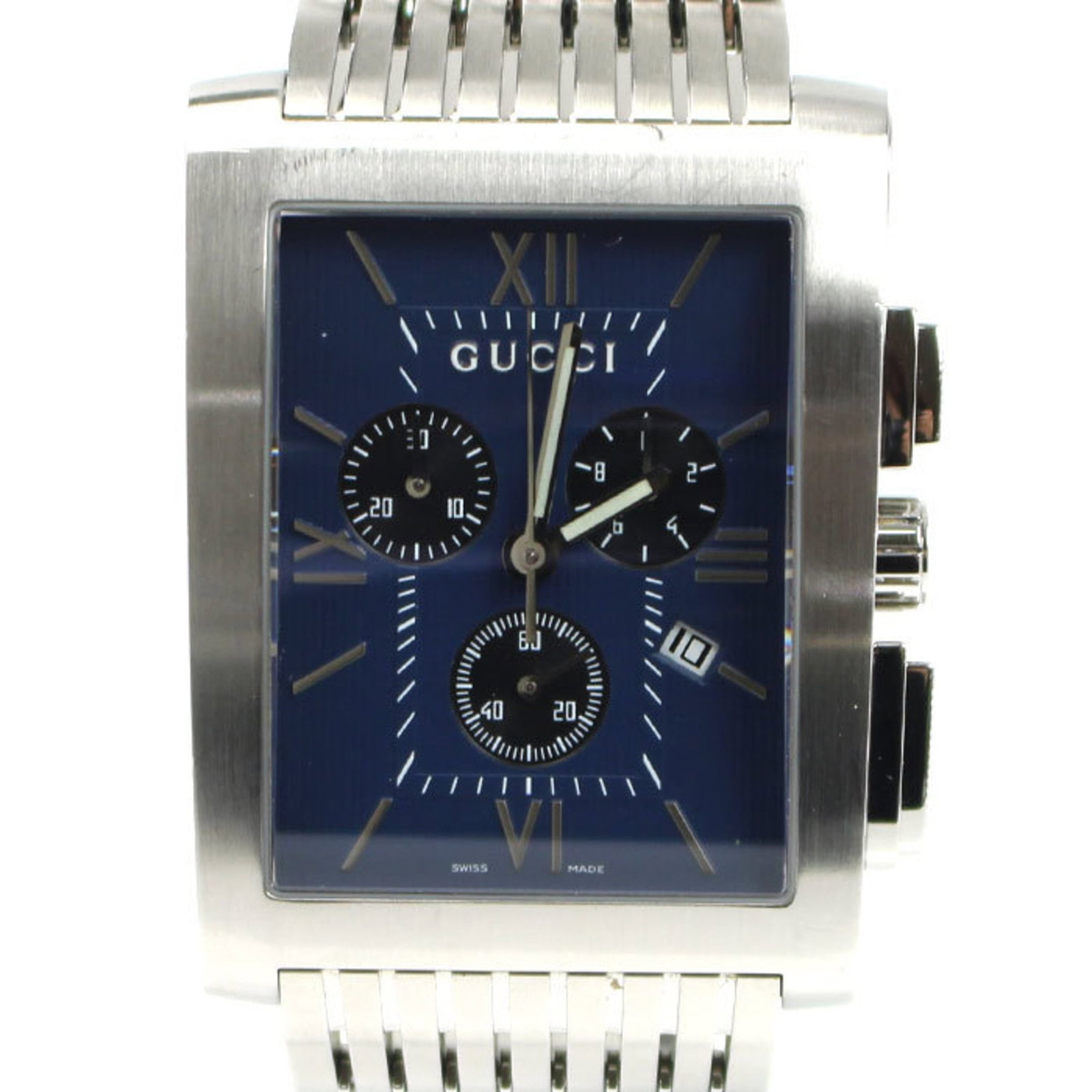 Strict Rules Apply: Strict Rules Apply Stainless steel case and band add an industrial touch to this navy dial Gucci wristwatch. The sapphire glass crystal provides protection from scratches and wear. Traces of usage are
