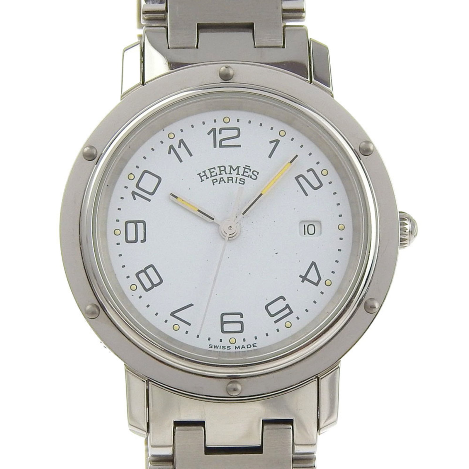 Watch Wrist Hermes: Watch Wrist Hermes Stainless steel case and band provide a sleek, modern look for this 38mm analog wristwatch. The white dial adds a touch of elegance, while the watch's condition shows signs of gentl