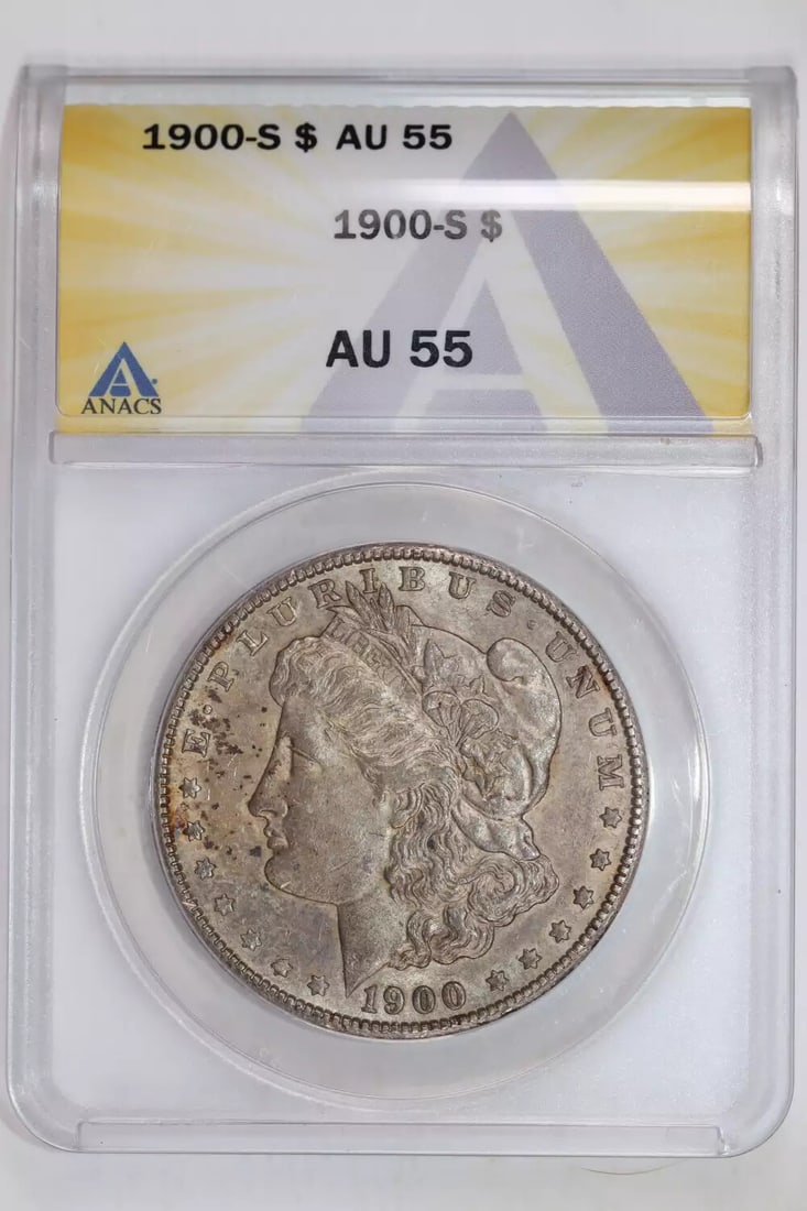 AU55 MORGAN DOLLAR 1900-S: AU55 MORGAN DOLLAR 1900-S The AU55 Morgan Dollar 1900-S features an attractive silver composition and a circulated mint mark from San Francisco. With a grade of AU 55, this coin showcases its