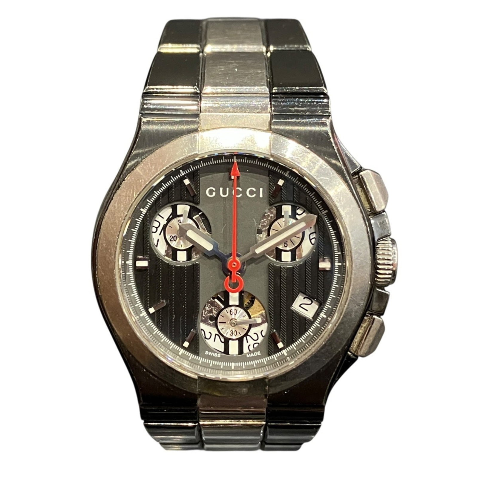 Strict Rules Apply: Strict Rules Apply Strictly speaking, this Gucci titanium wristwatch boasts a sleek black dial and case diameter of 33.3mm, making it suitable for wrists up to 13cm in size. The watch has traces of