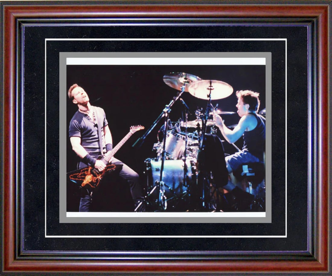 Unsigned Metallica Framed Photo 8x10: Unsigned Metallica Framed Photo 8x10 This unsigned Metallica framed photo is presented in an 8x10 cherry wood frame with black on matte white board. The piece features a high-quality image of the band
