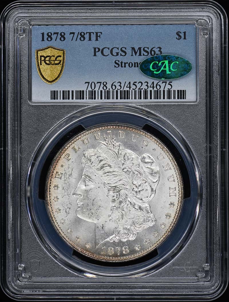 Morgan Dollar Strong 1878 7/ 8TF CAC MS63: Morgan Dollar Strong 1878 7/ 8TF CAC MS63 The Morgan Dollar Strong 1878 7/8TF CAC MS63 is an uncirculated coin with a PCGS certification number and grade of MS63. This coin features a unique
