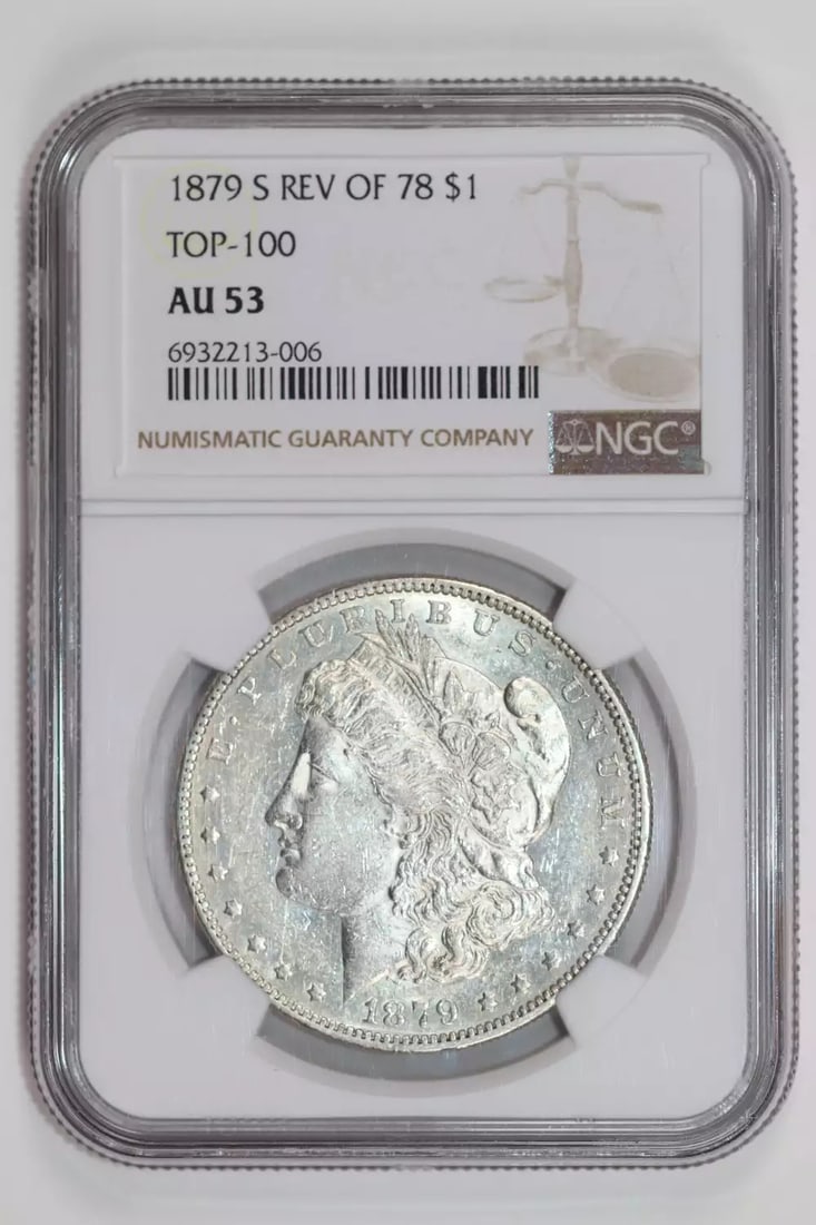 REVERSE 1880 MORGAN DOLLAR NGC AU53: REVERSE 1880 MORGAN DOLLAR NGC AU53 The Reverse 1880 Morgan Dollar features a striking design with Lady Liberty's profile on the obverse and an eagle on the reverse. This circulated coin from the San 