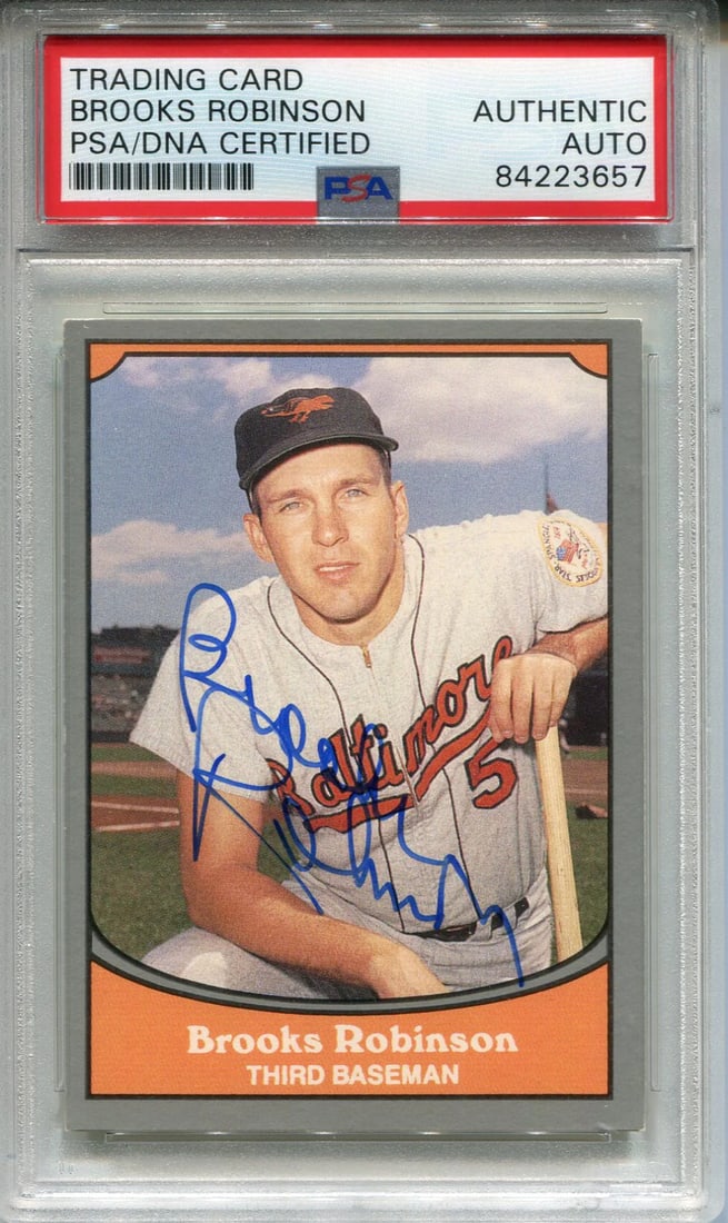 Autographed 1990 Pacific Card by Brooks Robinson: Autographed 1990 Pacific Card by Brooks Robinson Authentic Brooks Robinson autograph on a 1990 Pacific Card. The Professional Sports Authenticator (PSA) has authenticated and slabbed this