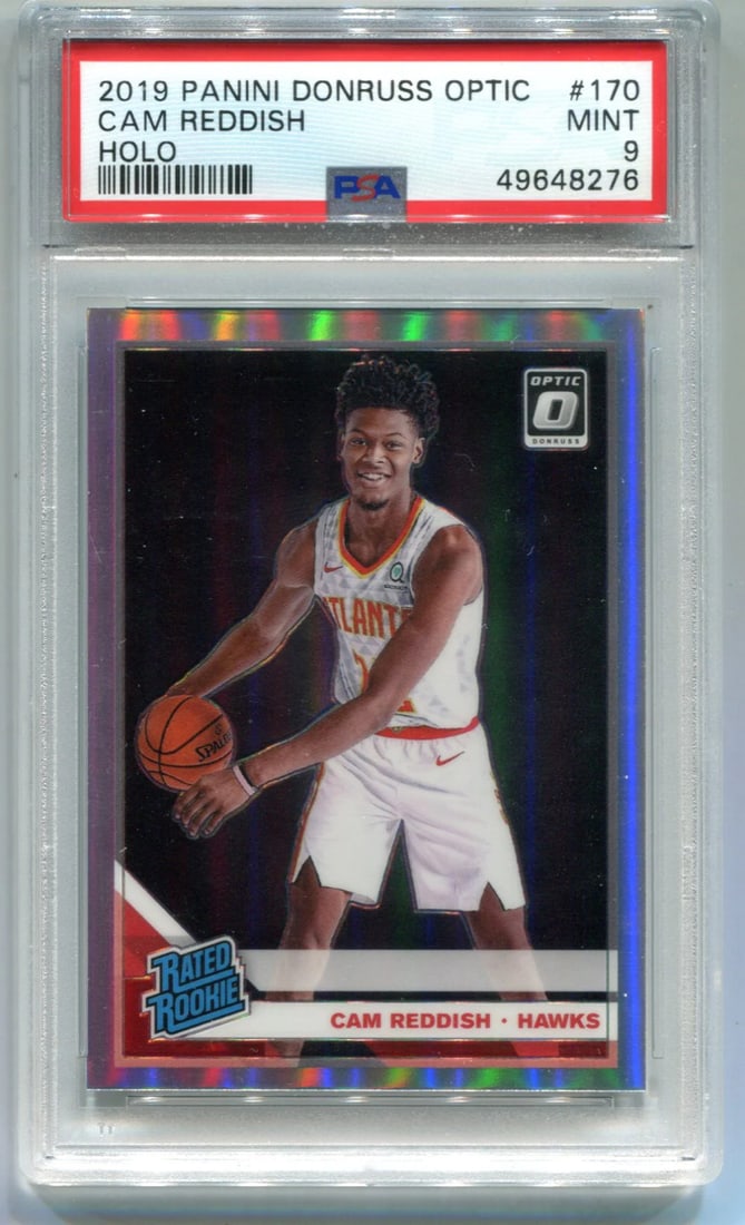 Cam Reddish Optic Holo 2019 Panini PSA Mint 9: Cam Reddish Optic Holo 2019 Panini PSA Mint 9 Cam Reddish Optic Holo 2019 Panini Donruss features a stunning optic hologram effect on this mint condition PSA-graded card. The Cam Reddish rookie card b