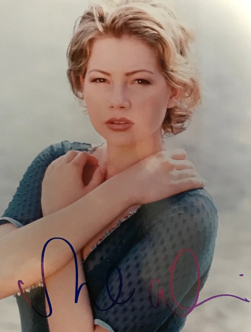 Celebrity Photo Autographed by Michelle Williams: Celebrity Photo Autographed by Michelle Williams Michelle Williams' blue sharpie signature adds a touch of elegance to this 8x10 celebrity photo. The photo itself captures her likeness in a candid