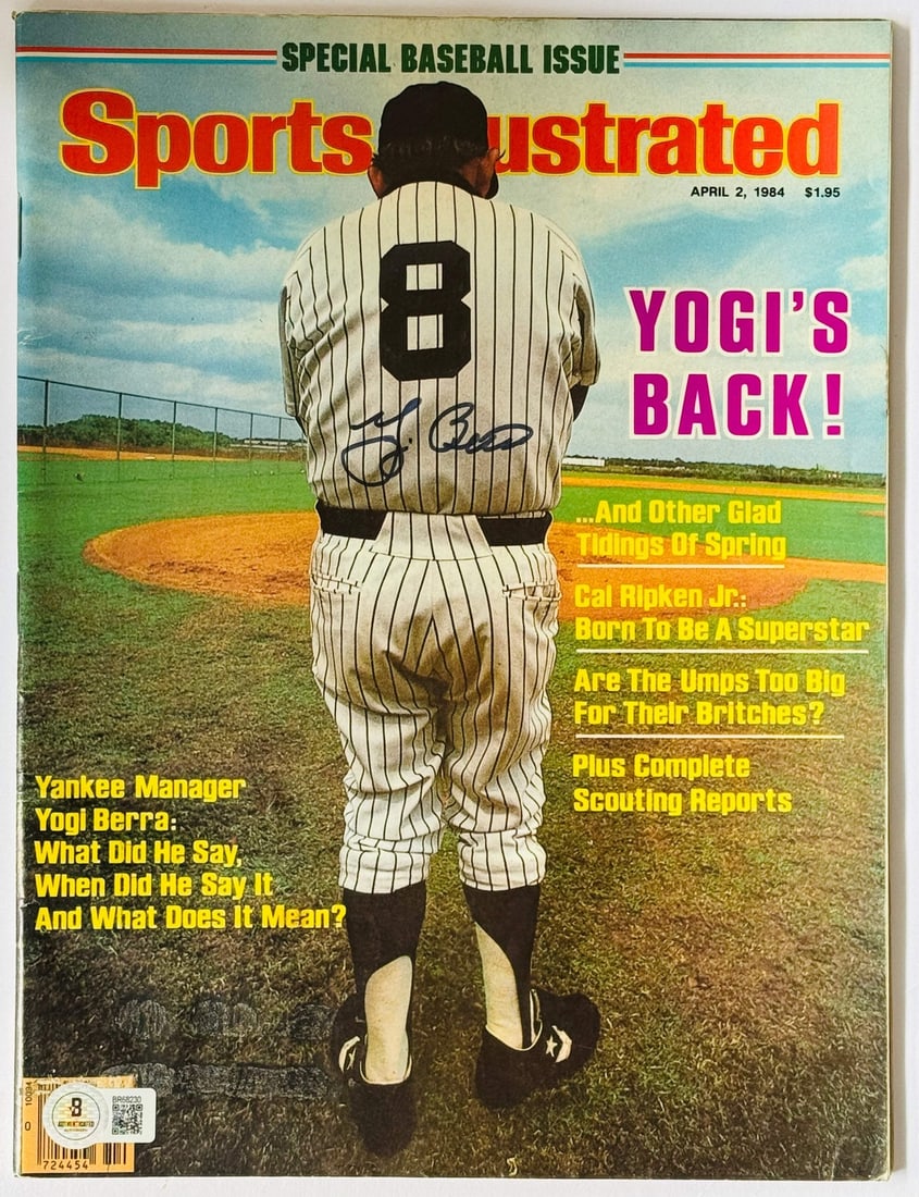 Sports Illustrated April 2 1984 Autographed By Yogi: Sports Illustrated April 2 1984 Autographed By Yogi Yogi Berra's blue sharpie signature across the front of this Sports Illustrated magazine from April 2, 1984, makes for a unique and fascinating piec