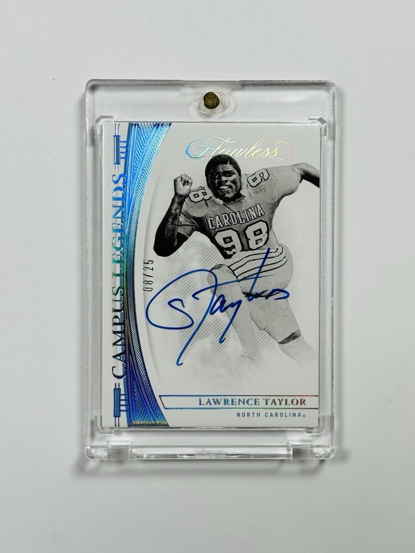 PANINI FLAWLESS CAMPUS AUTO LAWRENCE TAYLOR: PANINI FLAWLESS CAMPUS AUTO LAWRENCE TAYLOR Lawrence Taylor's autograph on this Panini Flawless Collegiate card adds authenticity to any sports collection. The card features an insert serial and is