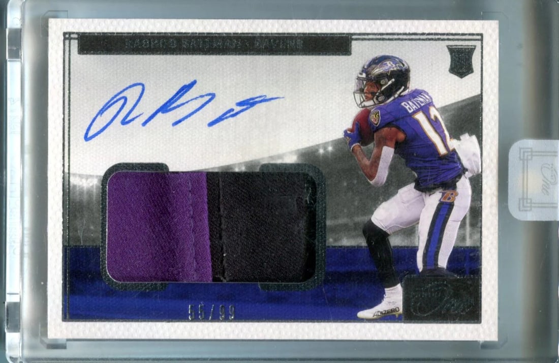Strict rule use only words from original title card auto jersey patch panini rashod batemon one 99: Strict rule use only words from original title card auto jersey patch panini rashod batemon one 99 Panini Rashod Batemon 2021 Panini One Jersey Patch Auto Card /99 - A rare and unique piece of sports 