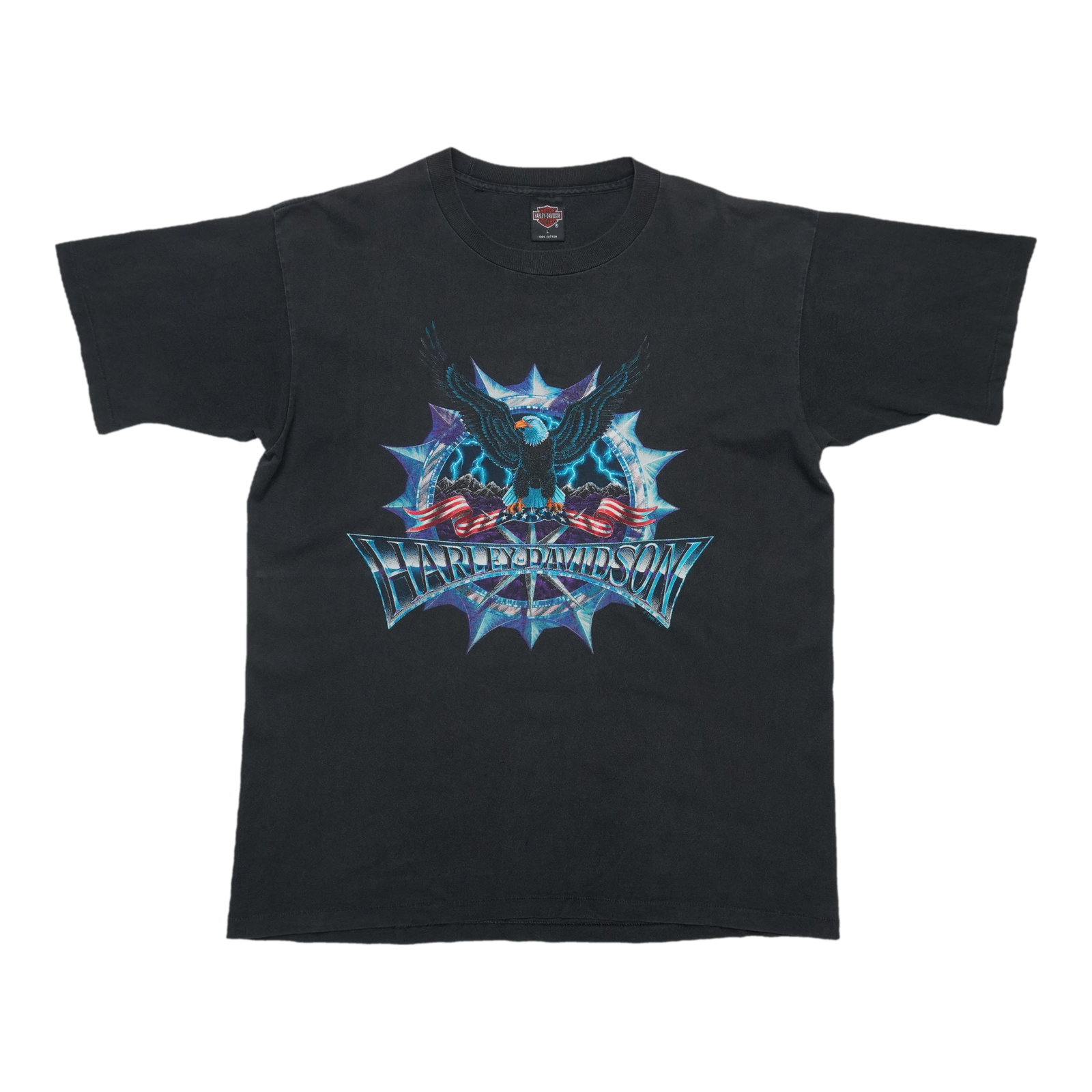 Harley Davidson Eagle Lightning Starburst Flags Shirt: Harley Davidson Eagle Lightning Starburst Flags Shirt The Harley Davidson Eagle Lightning Starburst Flags Shirt is a true vintage gem from the 1990s. With its bold front and back graphics, this 100% c