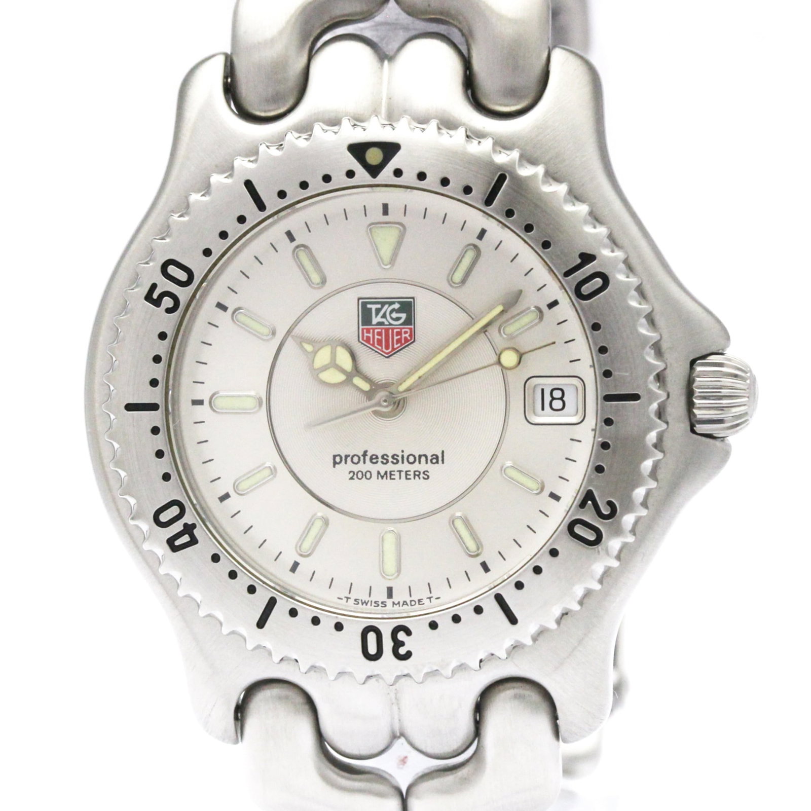 Heuer Watch Tag: Heuer Watch Tag Stainless steel case and band provide a sleek, modern look for this silver-dial Heuer watch. The 38mm diameter fits comfortably on most wrists, while its dress/formal style makes it