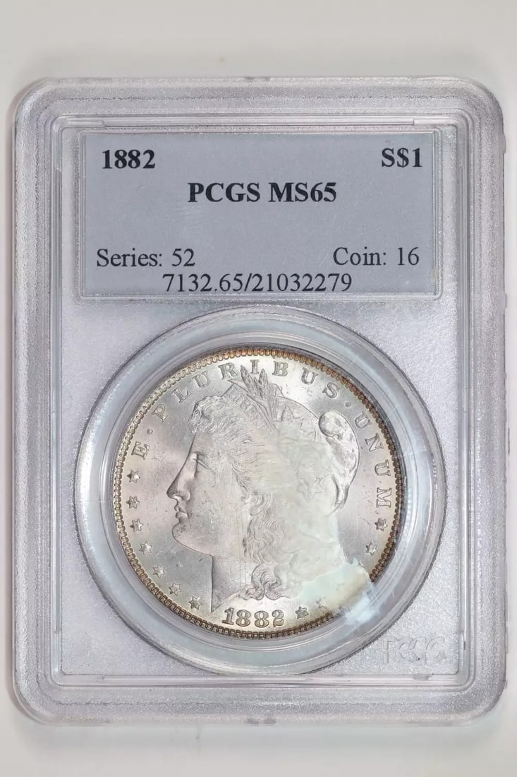 MORGAN DOLLAR MS65: MORGAN DOLLAR MS65 The Morgan Dollar MS65 features a stunning grade of MS 65 from the PCGS, indicating exceptional condition and preservation. Minted in 1882, this uncirculated coin showcases its