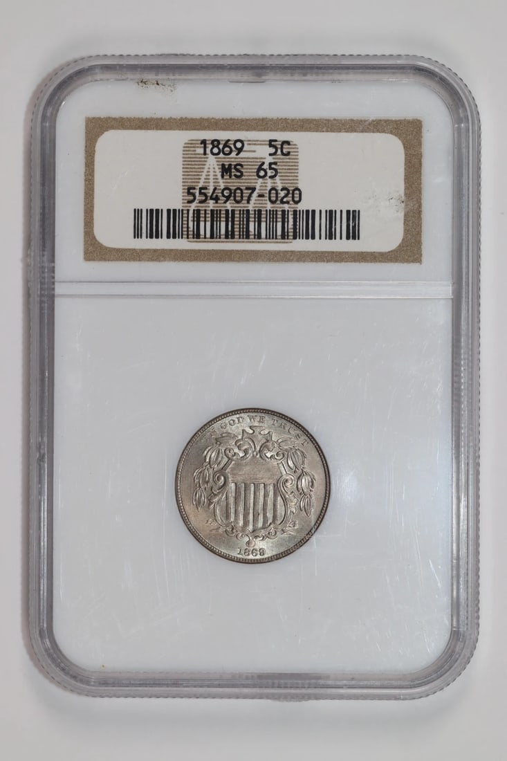 SHIELD NICKEL MS65: SHIELD NICKEL MS65 The Shield Nickel MS65 boasts an impressive MS 65 grade, indicating exceptional condition and quality. Certified by NGC, this circulated uncirculated coin features a striking design