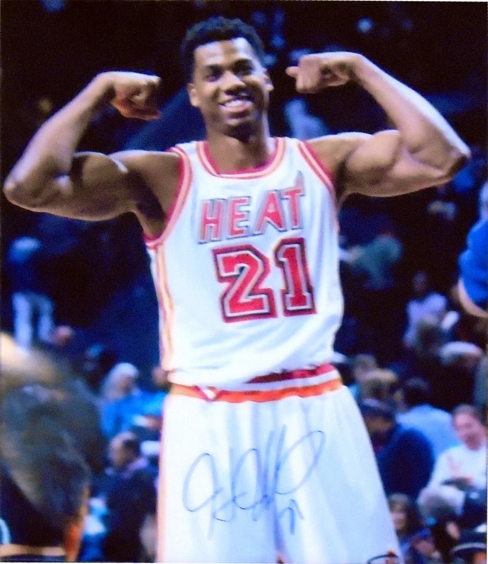 Miami Heat Flexing Autographed Photo 16x20 By Hassan: Miami Heat Flexing Autographed Photo 16x20 By Hassan Hassan Whiteside's dynamic pose after a big play is captured in this exclusive autographed photo, signed in blue sharpie across the front. The 16x2