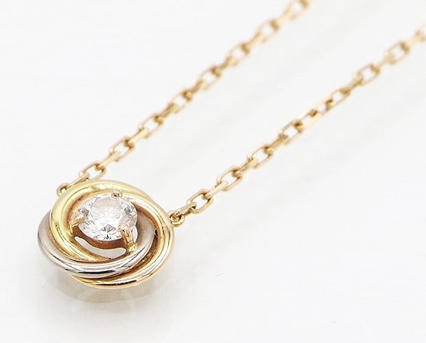 Cartier Trinity Center Diamond 18k Tri Color Gold Necklace Pendant with PaperBox: Cartier Trinity Center Diamond 18k Tri Color Gold Necklace Pendant with PaperBox 18k tri-color gold necklace features a Cartier Trinity Center Diamond pendant with one round diamond, set in a lobster 