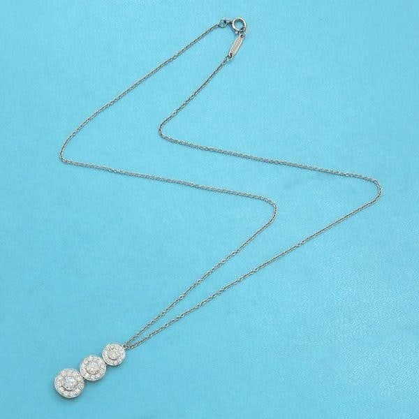 Tiffany & Co Circle Triple Drop Diamond Pt950 Pendant Necklace with Box 16.3 in: Tiffany & Co Circle Triple Drop Diamond Pt950 Pendant Necklace with Box 16.3 in Tiffany & Co's Circle Triple Drop Diamond Pt950 Pendant Necklace boasts an elegant design with a round, white diamond at