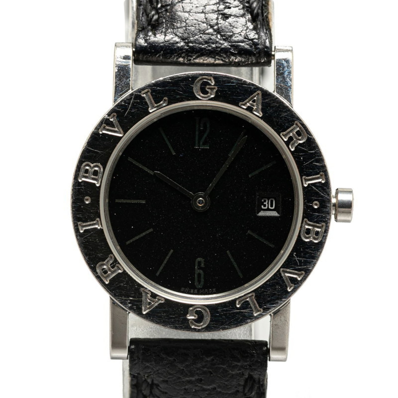 Bvlgari Wristwatch: Bvlgari Wristwatch Stainless steel case and black leather band give this Bvlgari wristwatch a sleek, sophisticated look. The analog display features bars at the hour markers, adding to its classic des