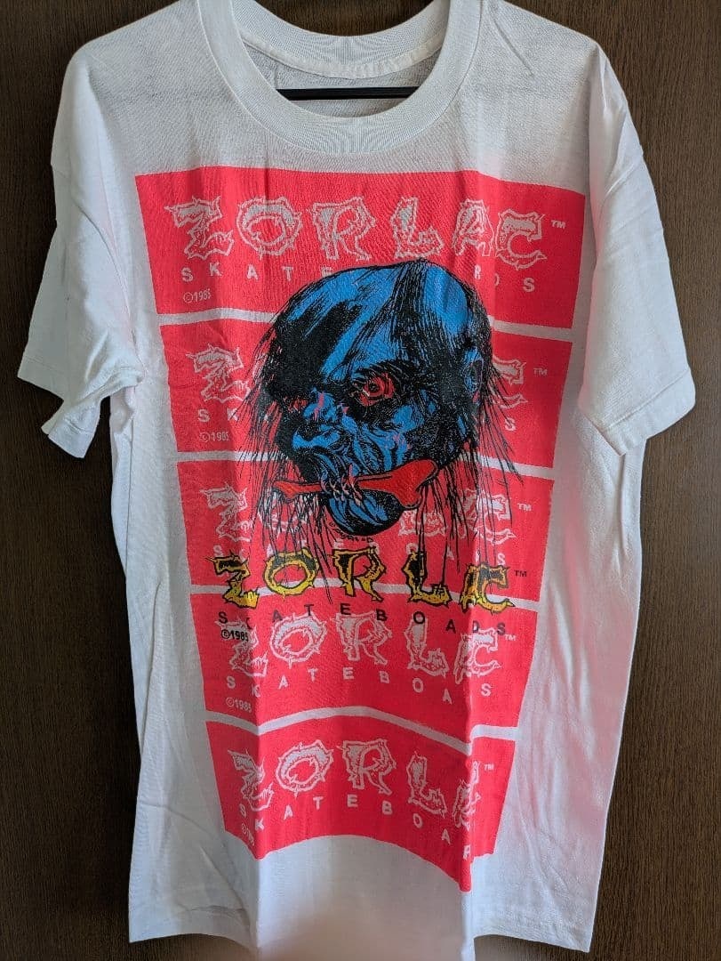 zorlac 80s multi-print T-shirt size L vintage 5 consecutive: zorlac 80s multi-print T-shirt size L vintage 5 consecutive Short sleeve crew neck T-shirt with a vibrant multi-print graphic, made from cotton and in size L. This vintage item bears a signature and w
