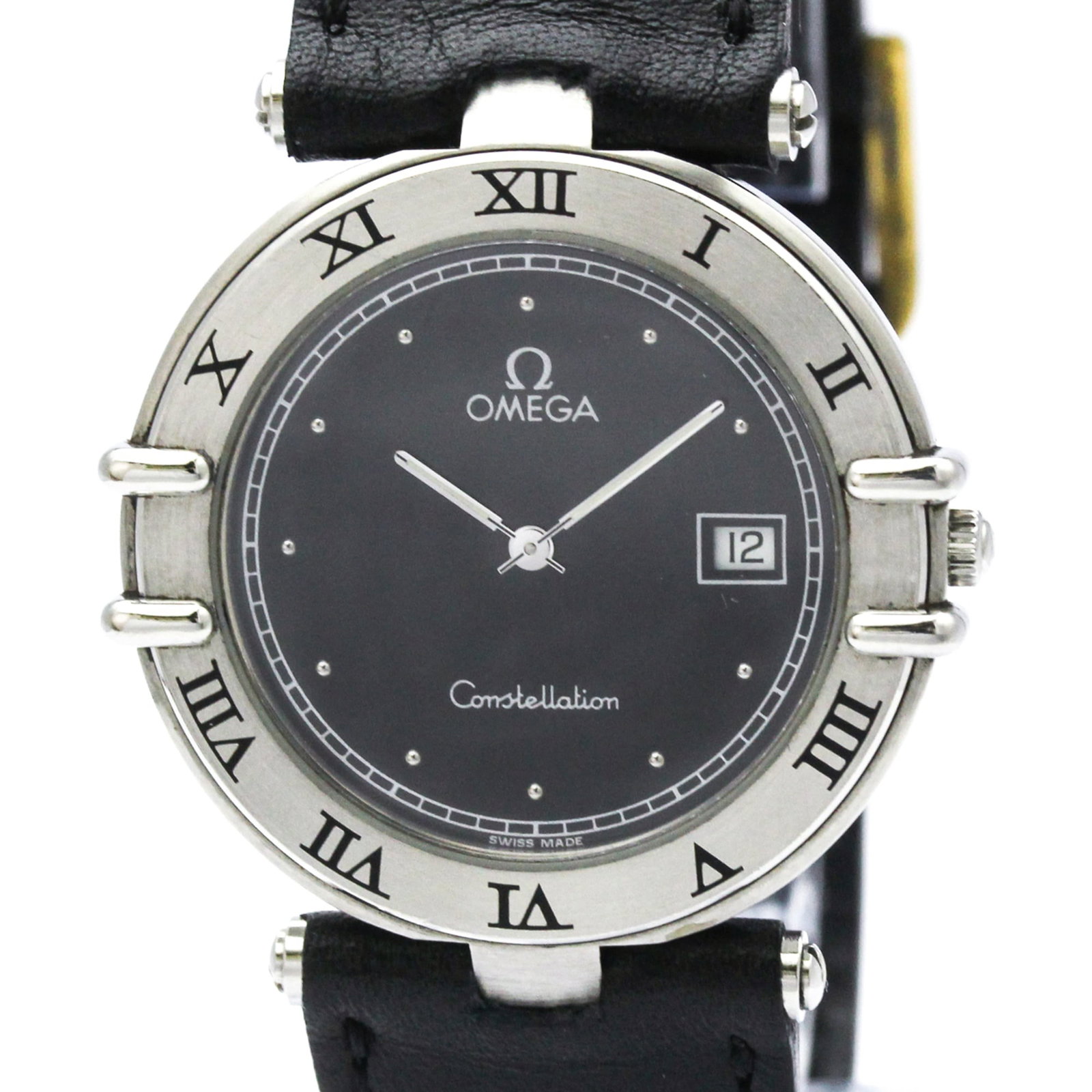 Omega Wristwatch: Omega Wristwatch Stainless steel case and black leather band make for a sleek, formal look. This Omega wristwatch boasts a classic design with subtle scratches and minor wear, giving it a well-loved f
