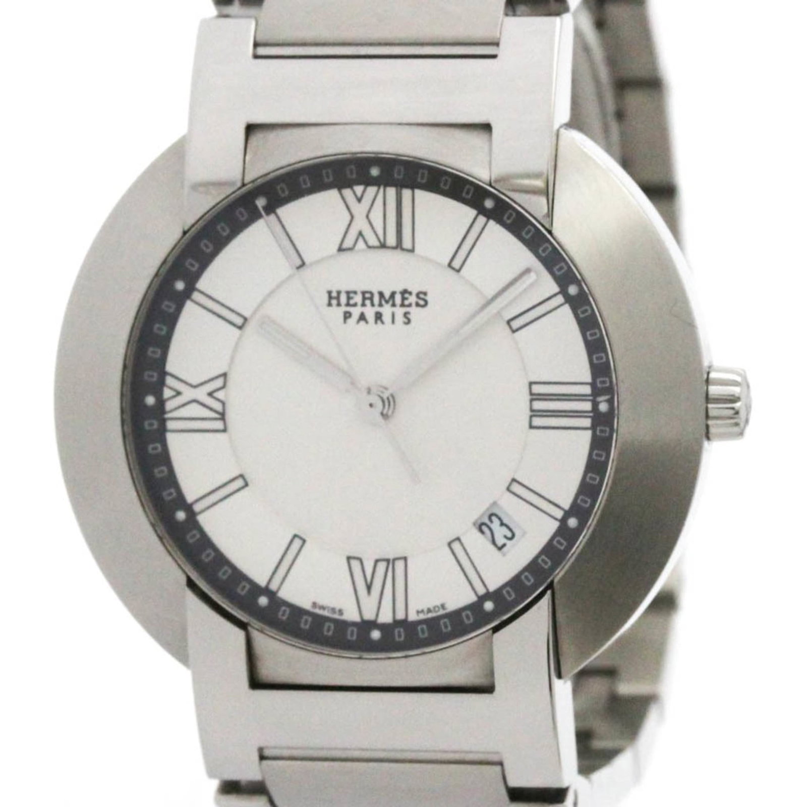 Hermes Wristwatch: Hermes Wristwatch Stainless steel case and band add a touch of sophistication to this silver dial Hermes wristwatch, featuring a classic dress/formal style. The 39mm diameter watch boasts a few traces