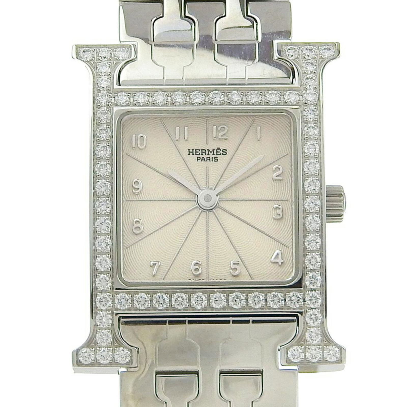 Hermes Wristwatch: Hermes Wristwatch Stainless steel case and band, the Hermes wristwatch boasts a sleek silver dial. With its 21mm diameter and comfortable 15.5cm length, it's designed to fit a variety of wrists. Used 
