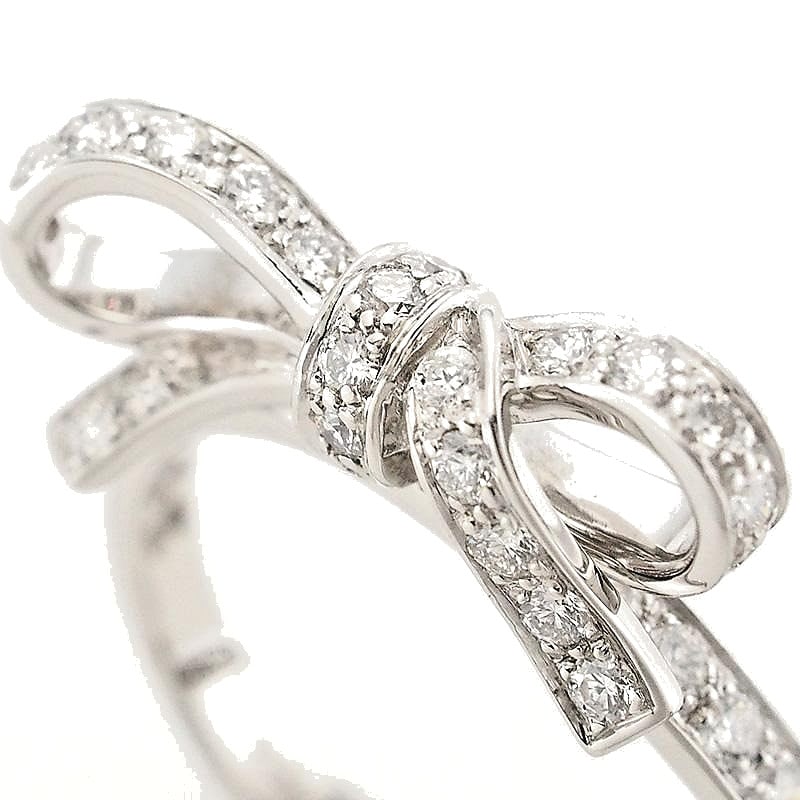 Diamond pave bow ribbon 18k white gold ring size 51 gift polished Christian Dior: Diamond pave bow ribbon 18k white gold ring size 51 gift polished Christian Dior 18k white gold ring with a stunning diamond pave bow design, set in a elegant band. This beautiful piece features