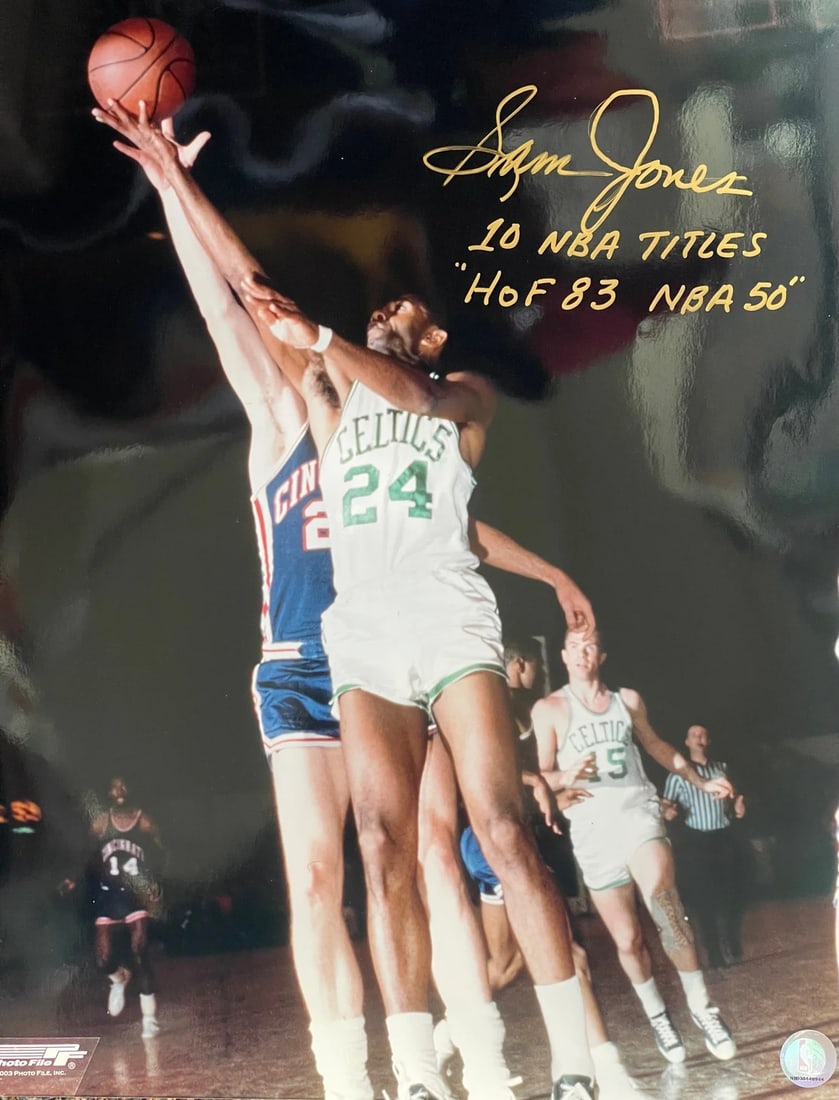 Sam Jones Autographed 16x20 Basketball Photo: Sam Jones Autographed 16x20 Basketball Photo Signed in gold sharpie across the front of the photo with inscription "HOF 83, NBA 50 ,10 Titles" by Sam Jones. This unique 16x20 basketball photo showcase