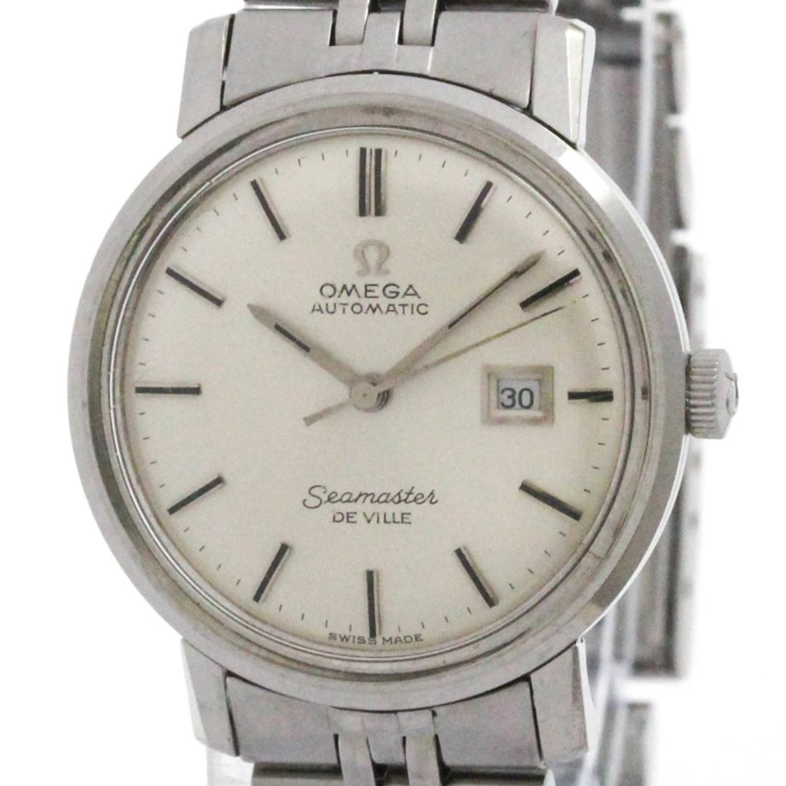 Omega Wristwatch: Omega Wristwatch Stainless steel case and band, silver dial, and classic Omega design make this dress wristwatch a timeless choice. With its 28mm diameter and used condition, it shows signs of wear bu
