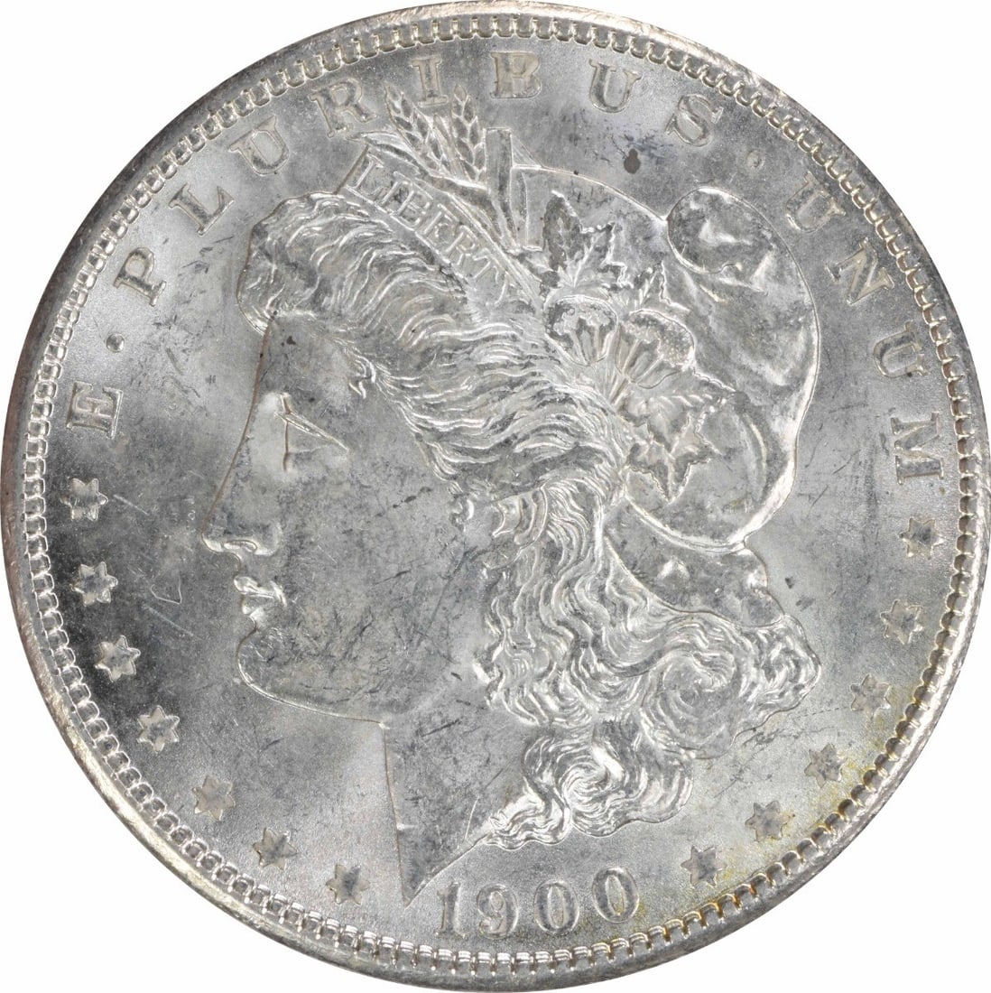 Morgan Silver Dollar Choice BU Uncertified: Morgan Silver Dollar Choice BU Uncertified Choice BU Uncertified Morgan Silver Dollar, minted in 1900 with its original silver composition. This uncirculated coin features the iconic design of the Mor