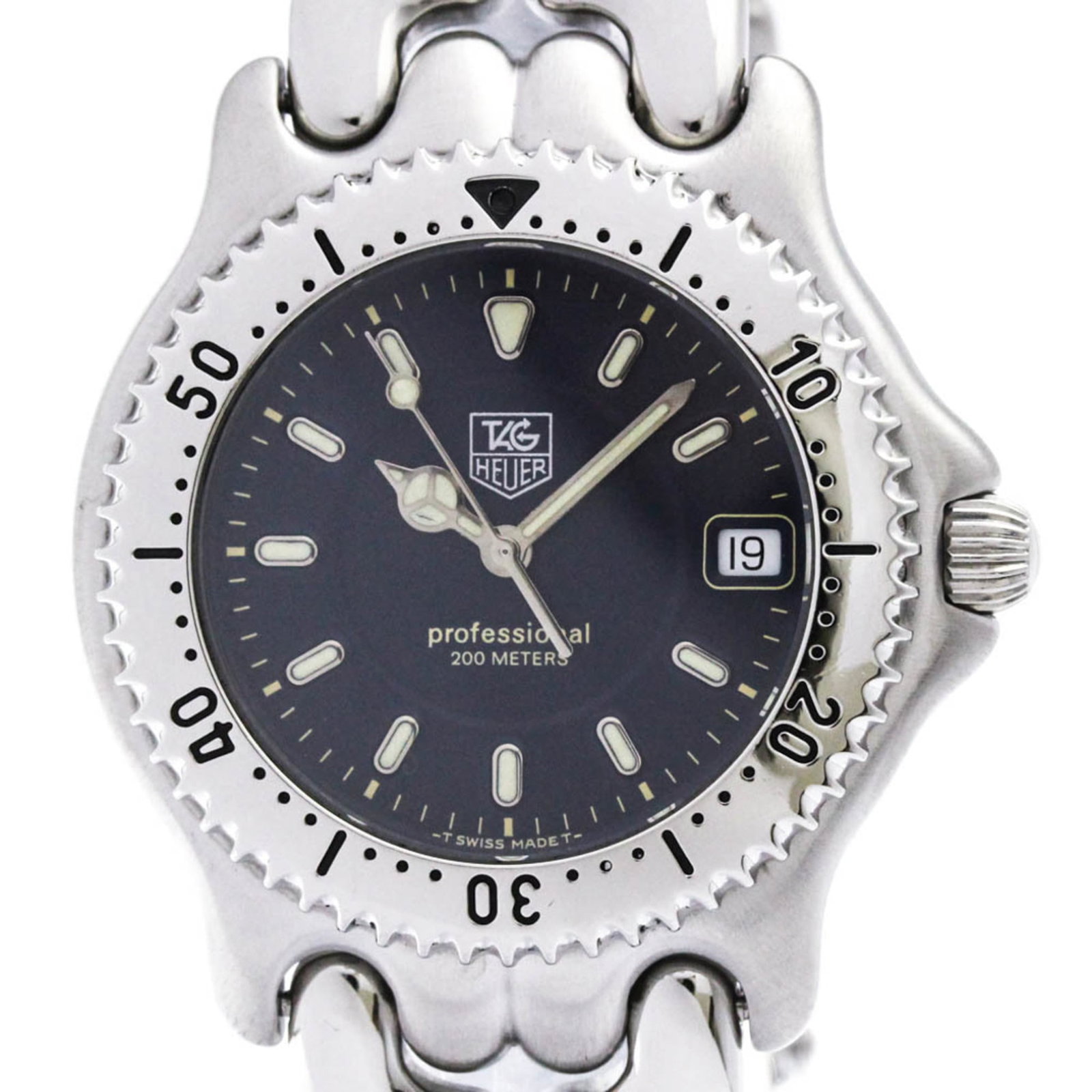 Wristwatch by Tag Heuer: Wristwatch by Tag Heuer Stainless steel case and band, the Tag Heuer wristwatch boasts a sleek blue dial. Measuring 38mm in diameter, this dress/formal timepiece features a classic design that exudes 