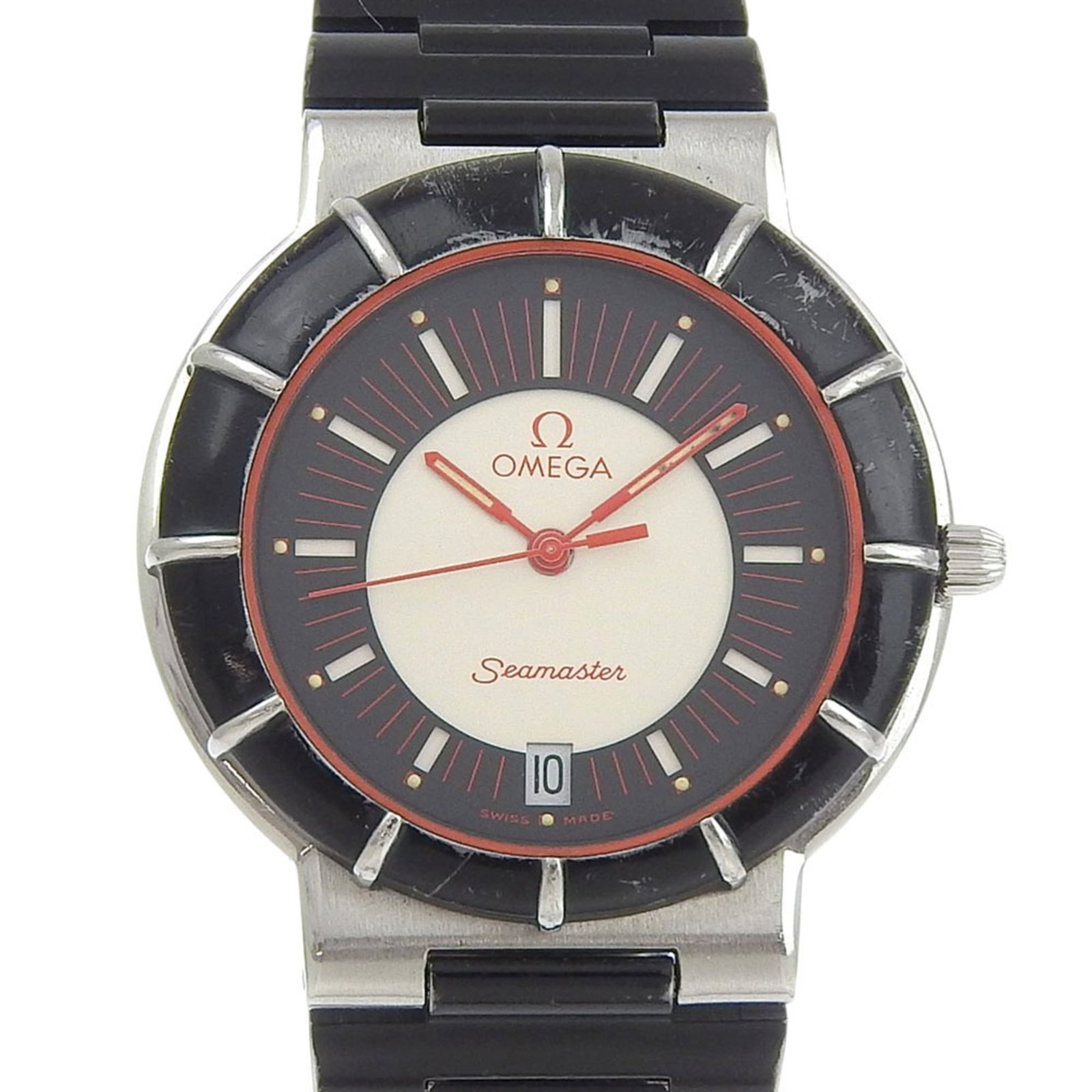 Omega Wristwatch: Omega Wristwatch Stainless steel case and band provide a sleek, durable finish. The multi-color dial adds visual interest to this classic analog watch design. With its 34mm diameter and 7mm thickness,