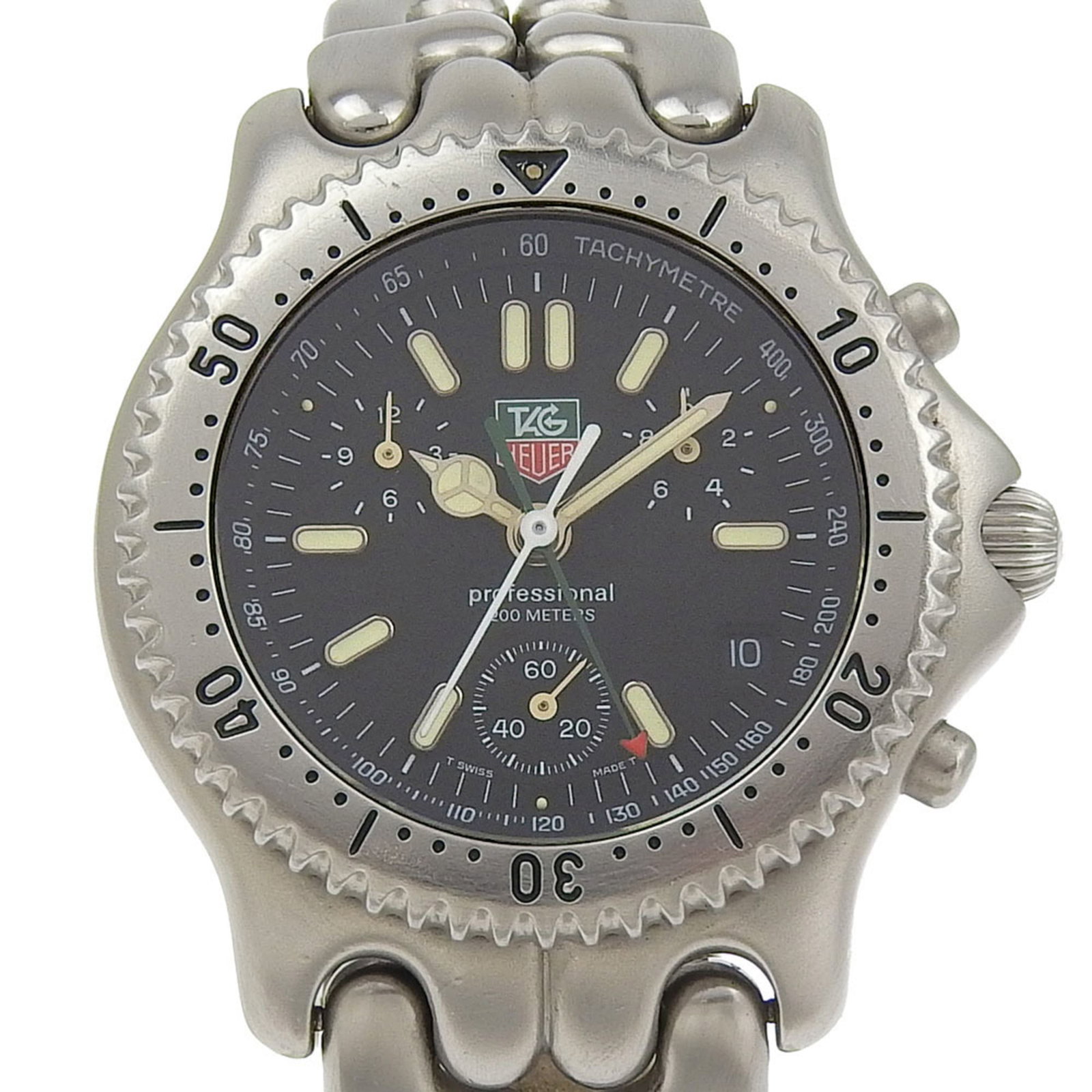 Wristwatch by Tag Heuer: Wristwatch by Tag Heuer Stainless steel case and band add a touch of sophistication to this classic Tag Heuer wristwatch, with its sleek black dial and durable construction. Measuring 41mm in